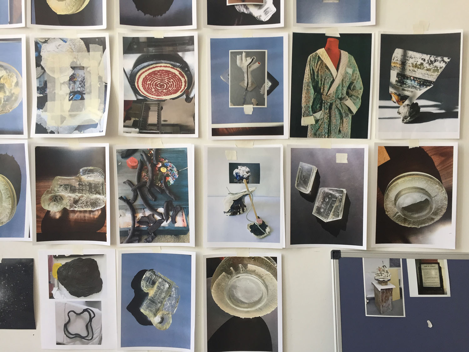   A Whirrlrld,  2017, color laser prints, digital chromogenic prints, archival pigment prints on paper, Polaroid, tape, glazed ceramic, QuakeHold!, graphite on paper, t-pins , dry erase board, size variable 