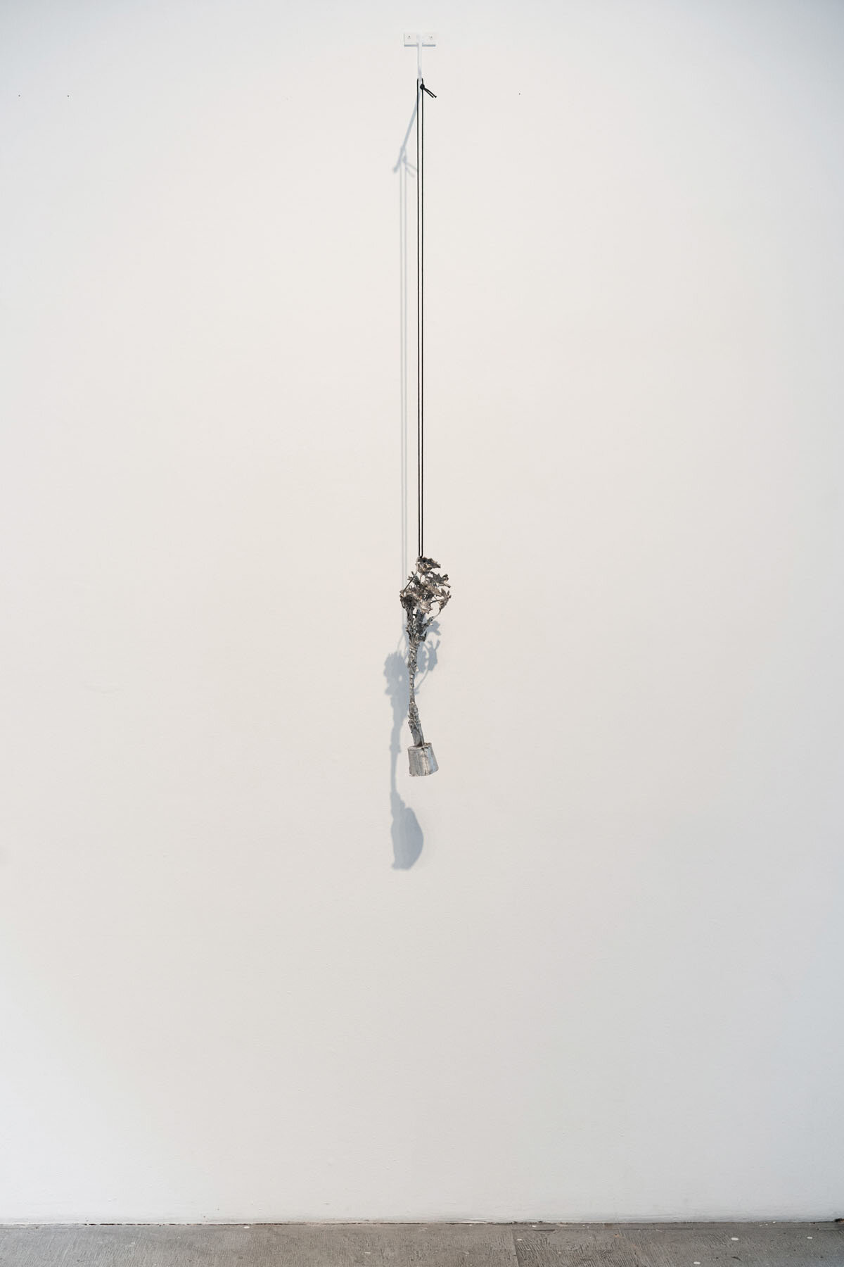   Forever Flowers , 2019, cast aluminum, rope, steel, spray paint, 71 x 8.5 x 3.5 inches 