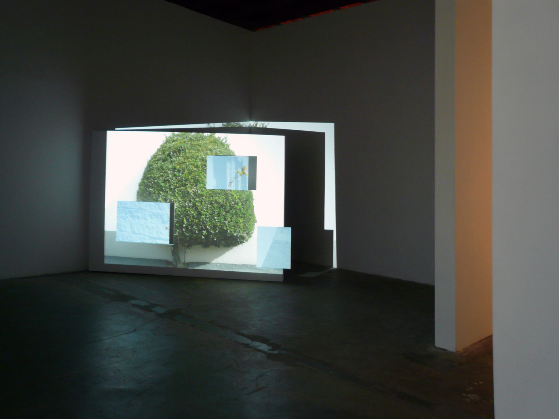   Here to There , installation view, 2007, 35-minute projected animation with 4 soundtracks, sheetrock, wood, mounted wood boxes, 72 x 100 x 65 inches 