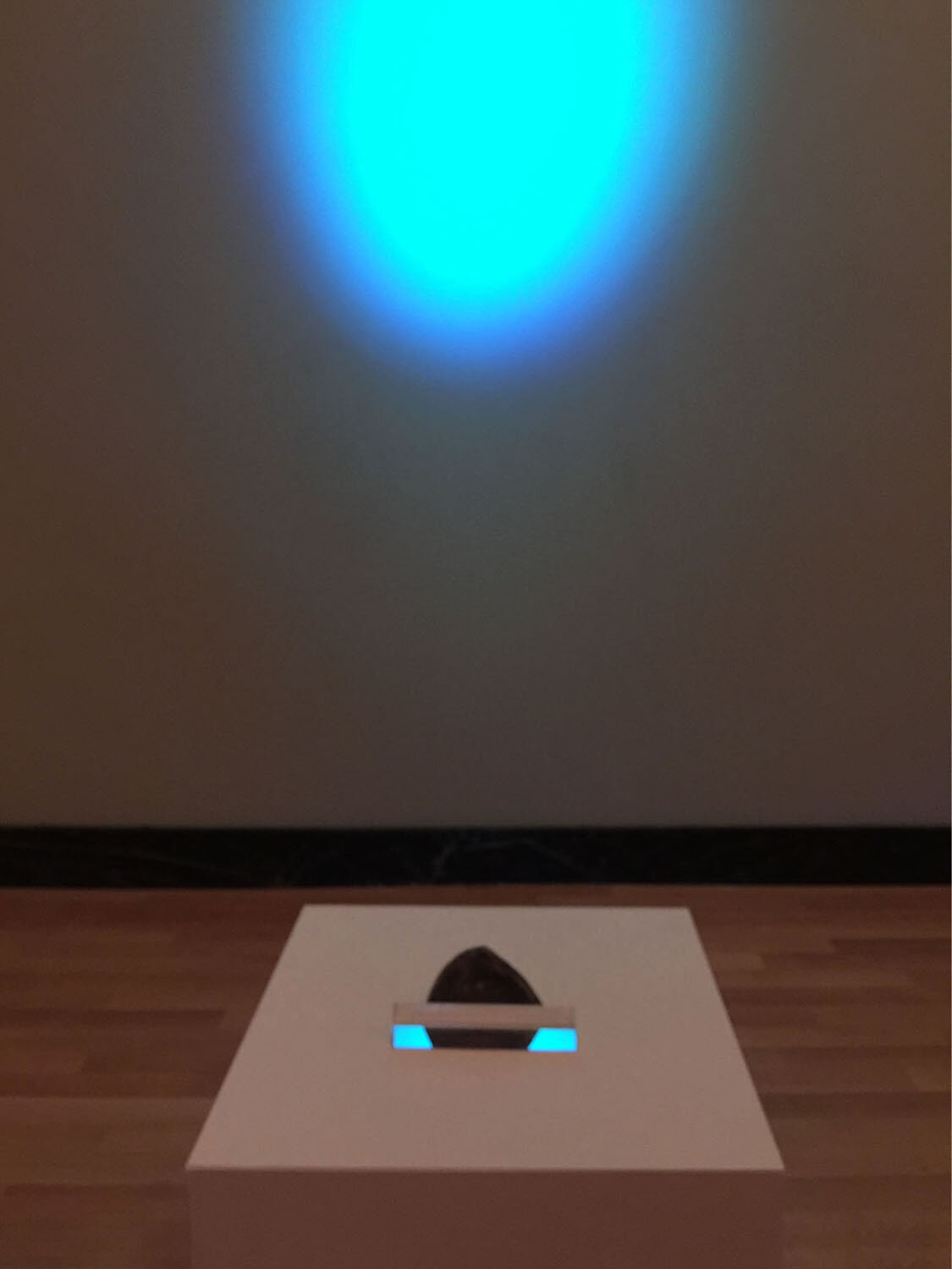   A Question of Sight , installation detail, 2014, LED strobe projection, glazed ceramic, glass prism, MDF, latex paint, 98 x 80 x 116 inches 