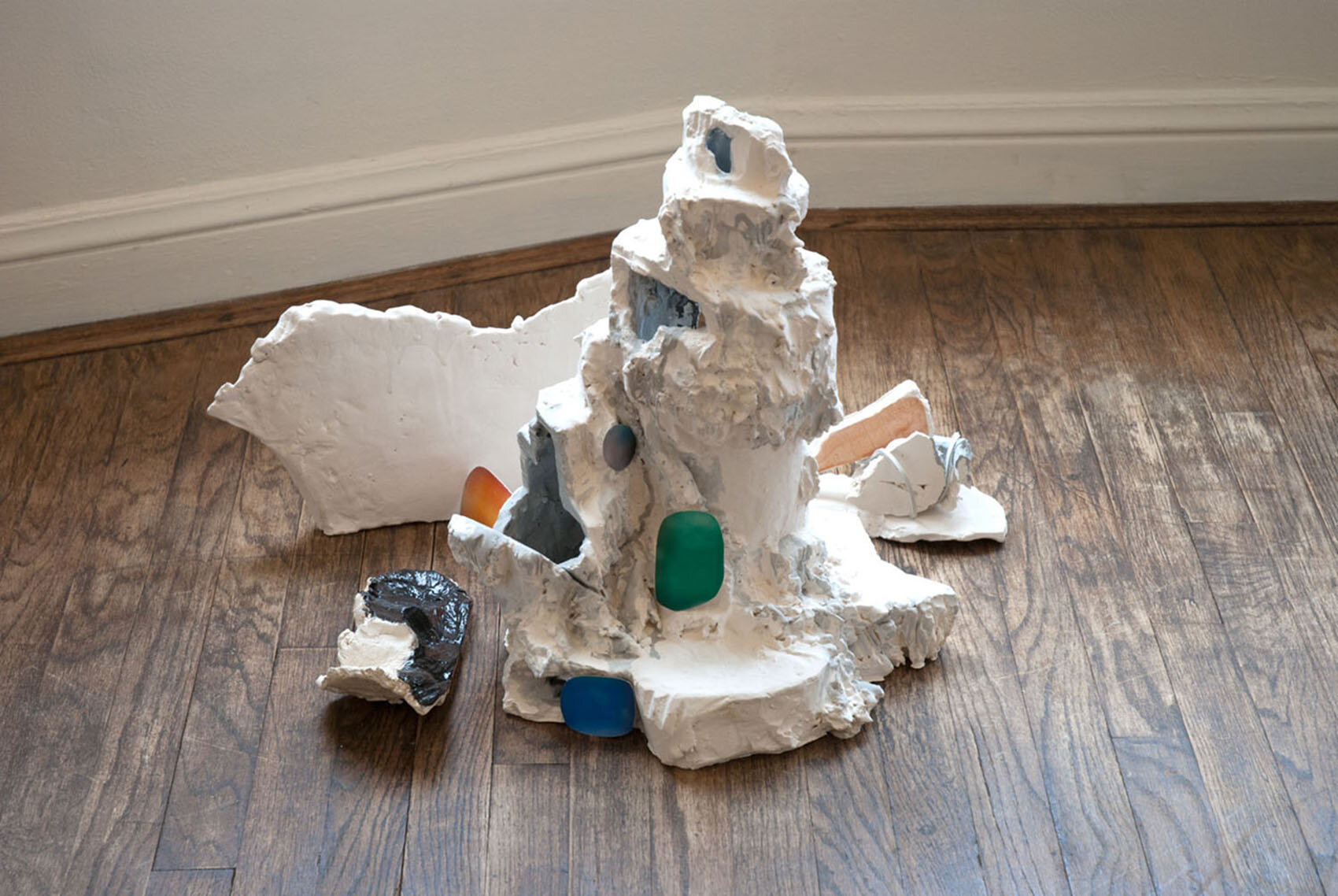   The Next Thing Happens (For Hewicker) , 2011, glazed ceramic, pigment prints, leather, 18 x 32 x 19 inches 