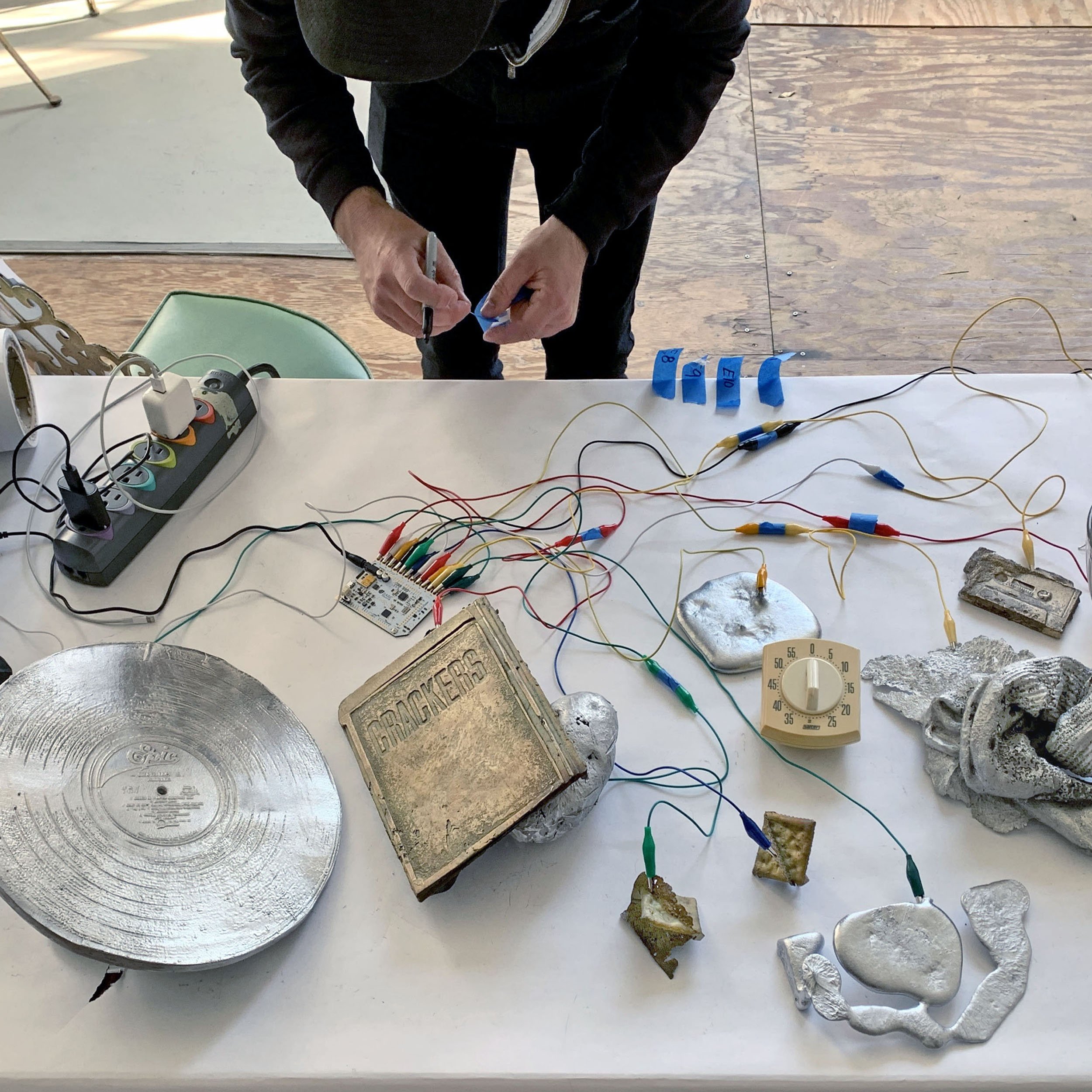  Studio detail, touch-activated instruments made from cast aluminum and bronze,  2019 