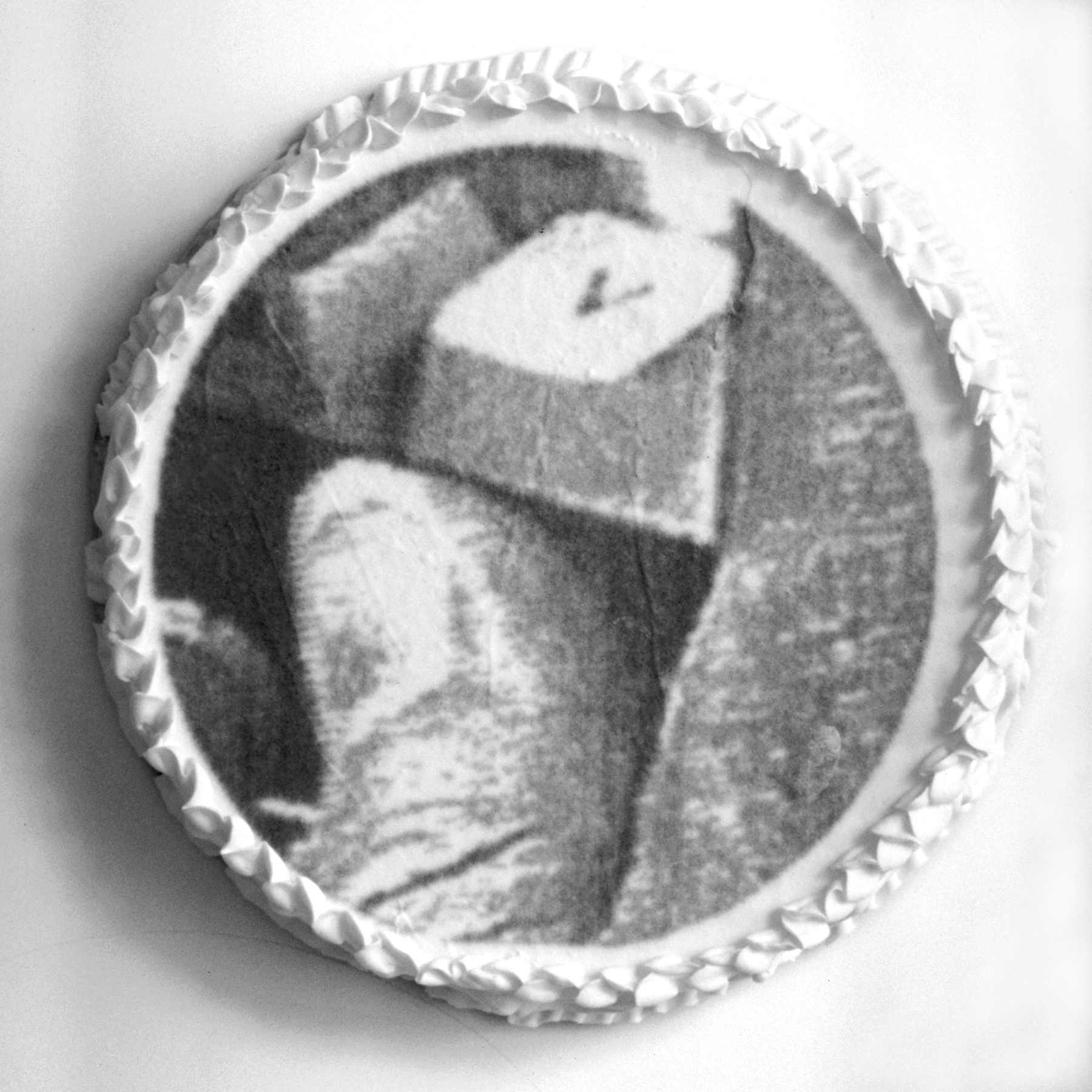   Fake Cake With Fingers and a V , 1995, styrofoam, sugar icing, black food coloring, 12 × 12 × 3 inches 