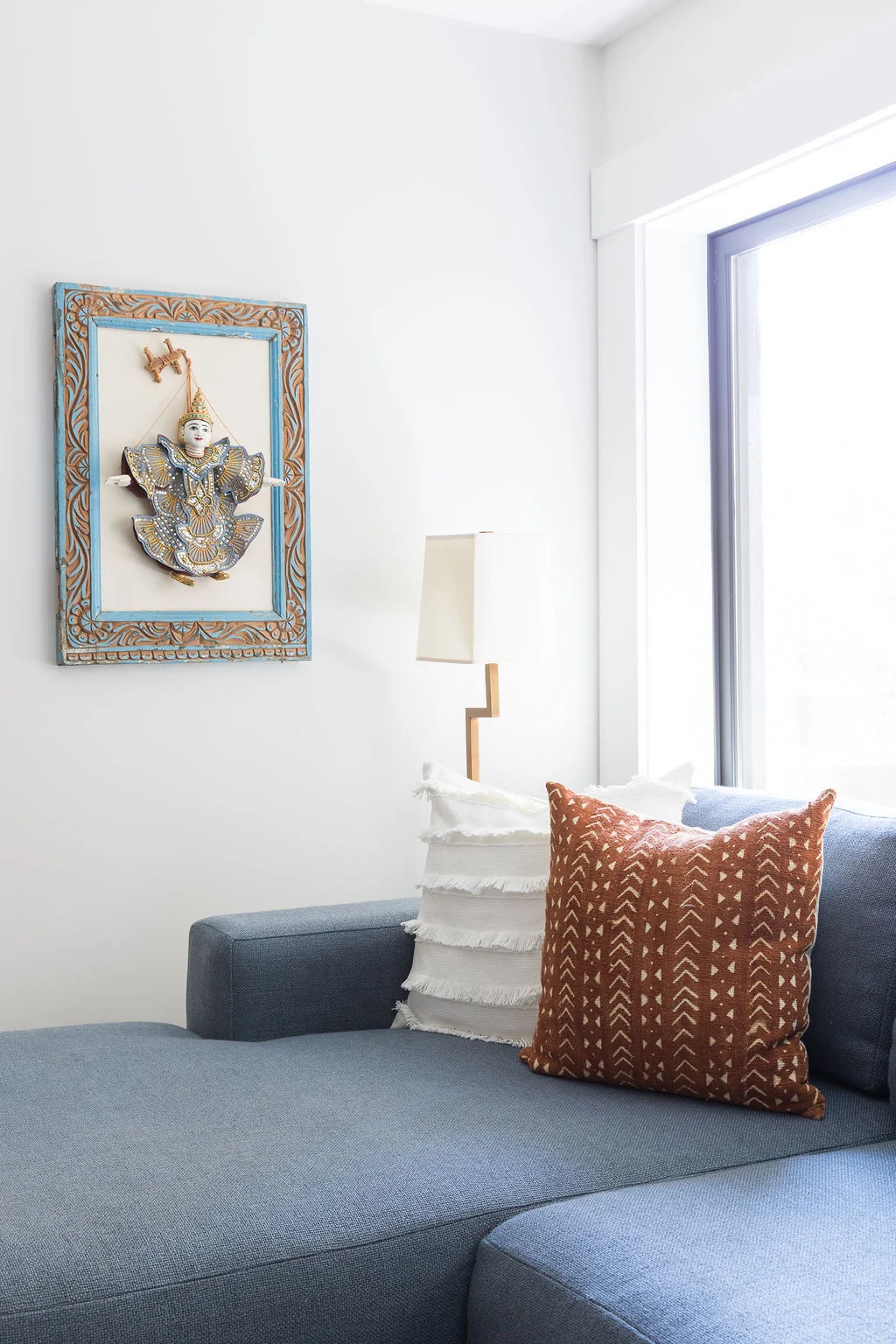 Love-&-Interiors-San-Francisco-Pacific-Heights-Cozy-Blue-and-Orange-Family-Room-with Sectional-Mudcloth-Pillow.jpg