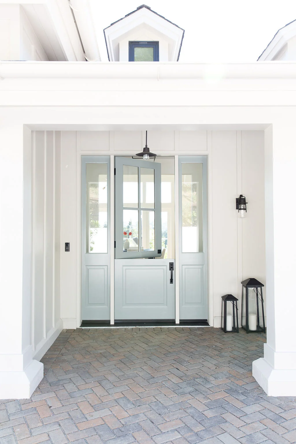 Love-&-Interiors-Mill-Valley-Modern-Farmhouse-Exterior-Blue-Dutch-Door_Black-Windows-Herringbone-Spec-Home.jpg