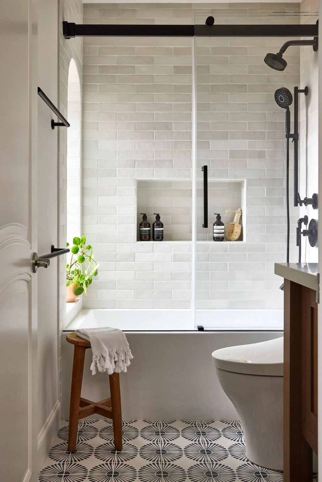 Love-and-Interiors_Glen-Park-Modern-Oasis-Guest-Bath-Patterned-Tile-Arched-Window.jpg