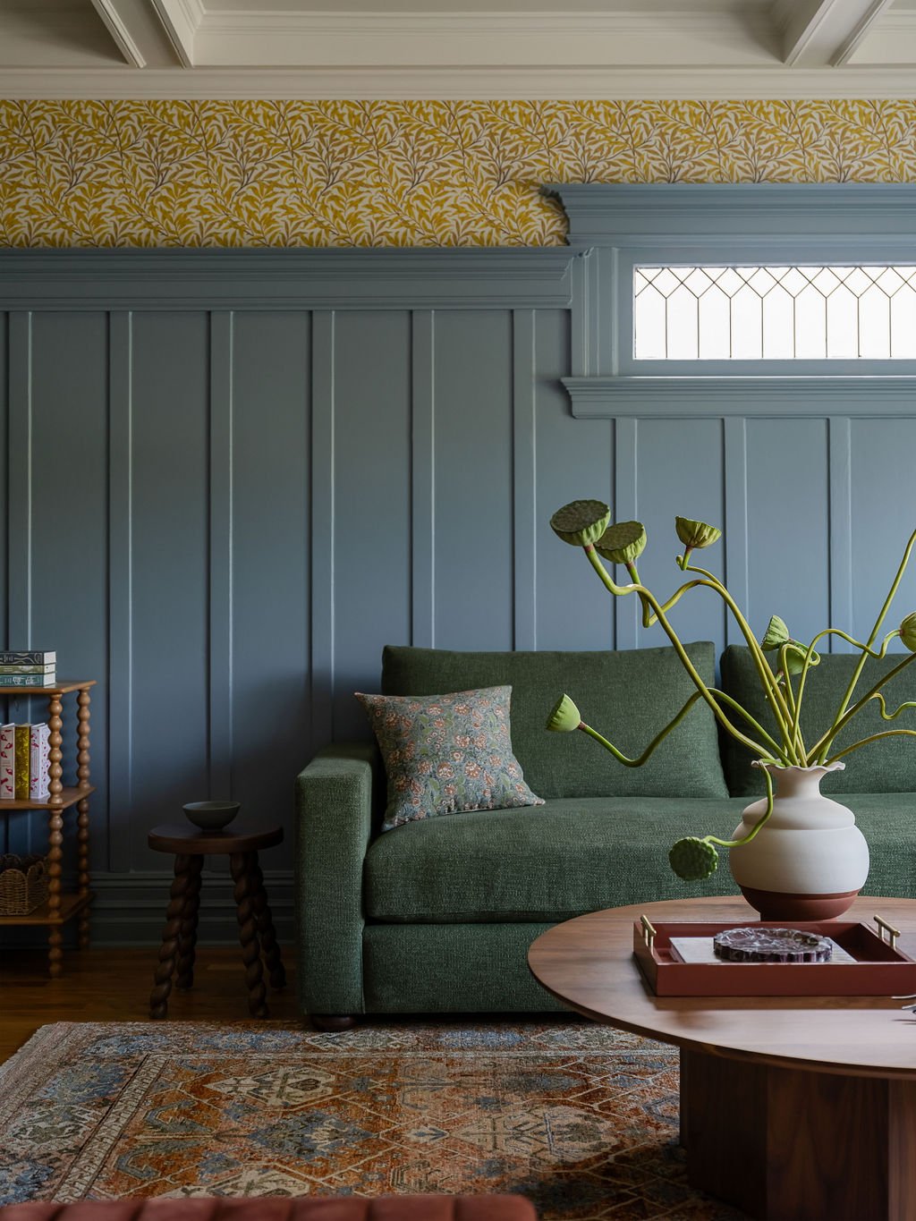 Love_and_Interiors__Family_Room_Blue_Paint_Wainscoating_Yellow_Wallpaper_Green_Sectional_Detail_San_Fra.jpg