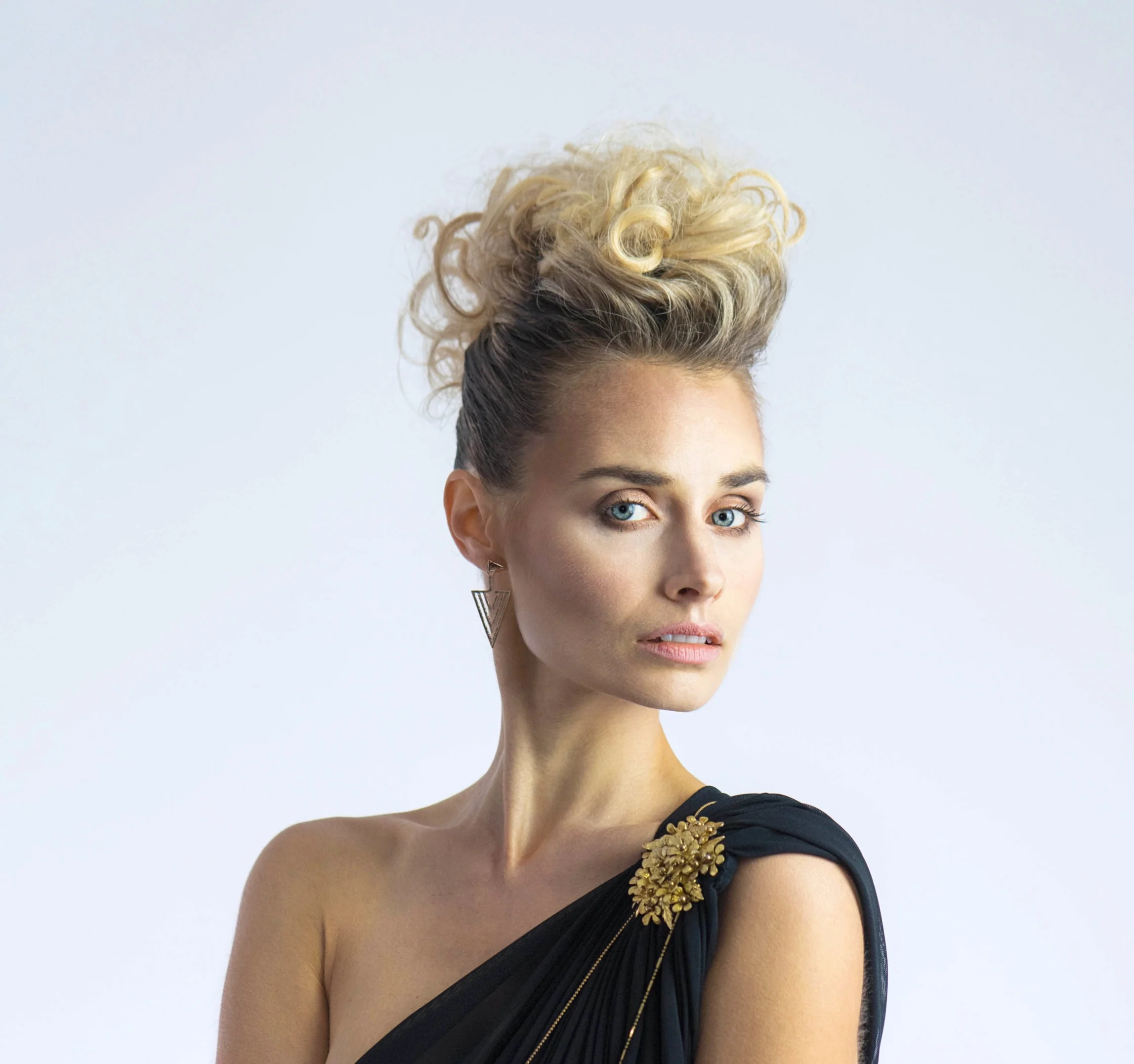 Editorial look designed to showcase Manasi Priya resortwear collection.  Up do achieves an elegant and sophisticated look.