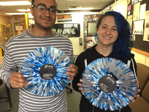 Pop Punk enthusiasts Joel Carrasquillo & Ashley Weltner showing off the stylish Fall Out Boy vinyl record!