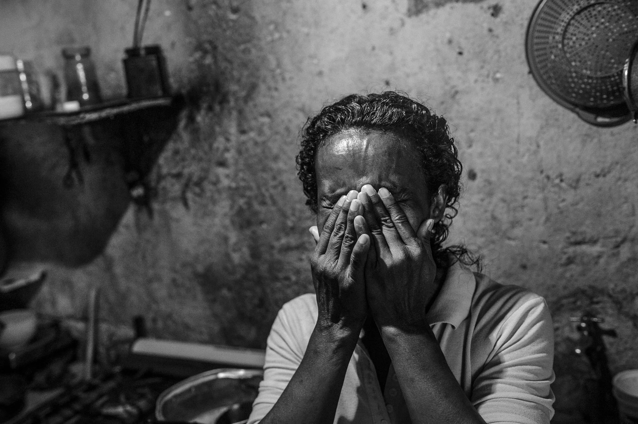  Paula, 48, bursts into tears in the kitchen of her shack in Petare, recalling how life in Venezuela has changed in a few years.&nbsp; 