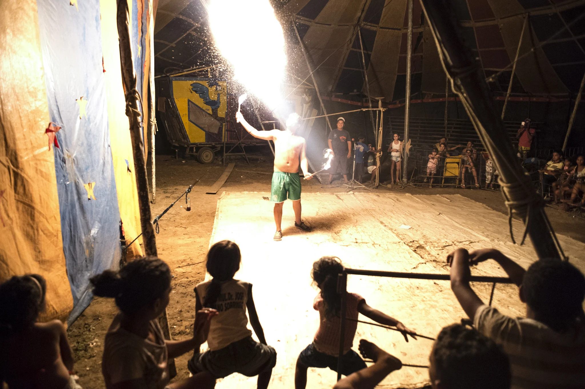  A fire eater performing in a small circus found near Ouricouri. The circus company, formed mostly by young people, is going through the Sertao bringing a fun show and a smile in remote areas of Brazil. 