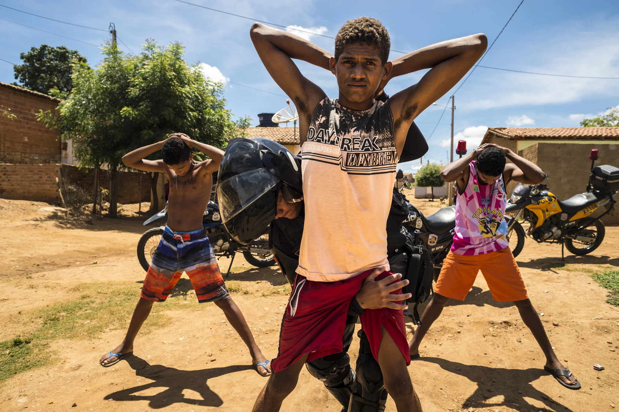  A group of young guys is searched during a police operation in a poor neighborhood of Salgueiro, Brazil. The military has increased operations as they seek to clamp down the growing marijuana industry in the area, considered the main production cent