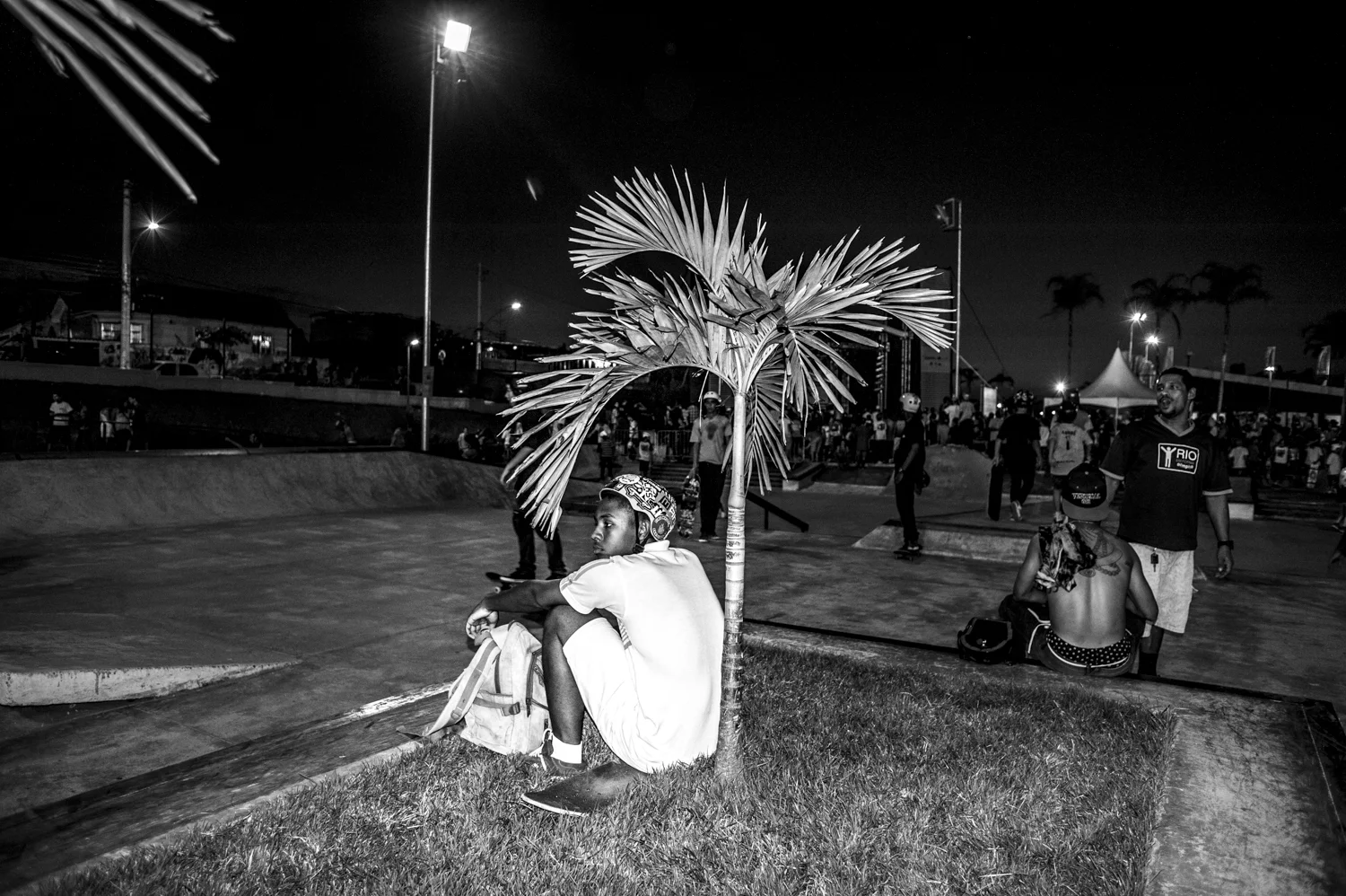  A young guy look at other skaters inside Parque da Madureira, the main point of aggregation for thousands of young guys coming from the northern areas of Rio de Janeiro. 