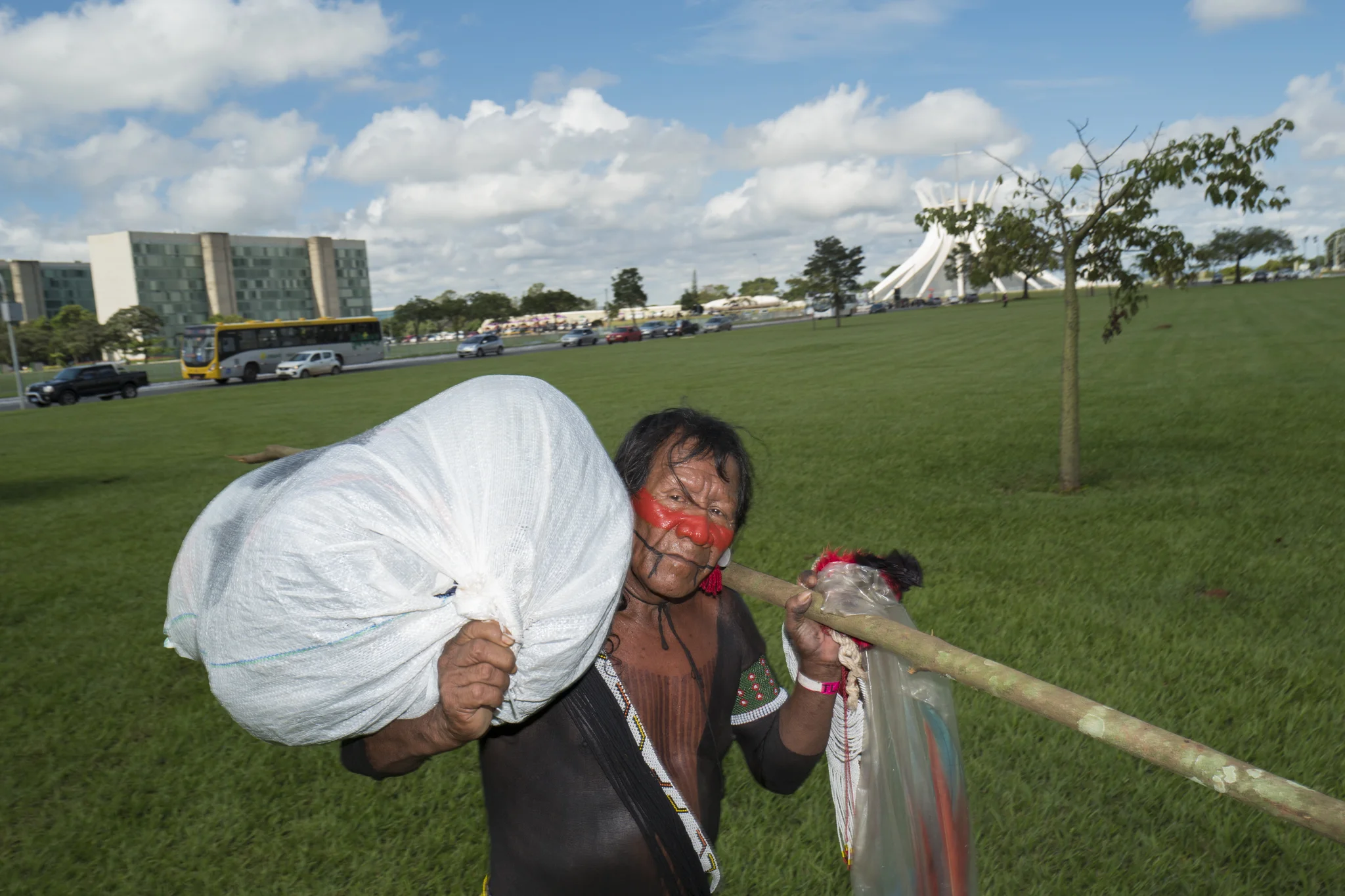  An old Kaiapo man is seen leaving with his belongings  after leaving the camp near the presidential buildings of brasilia after the military intimidation of the use of force against the Free Land camp in Brasilia. 