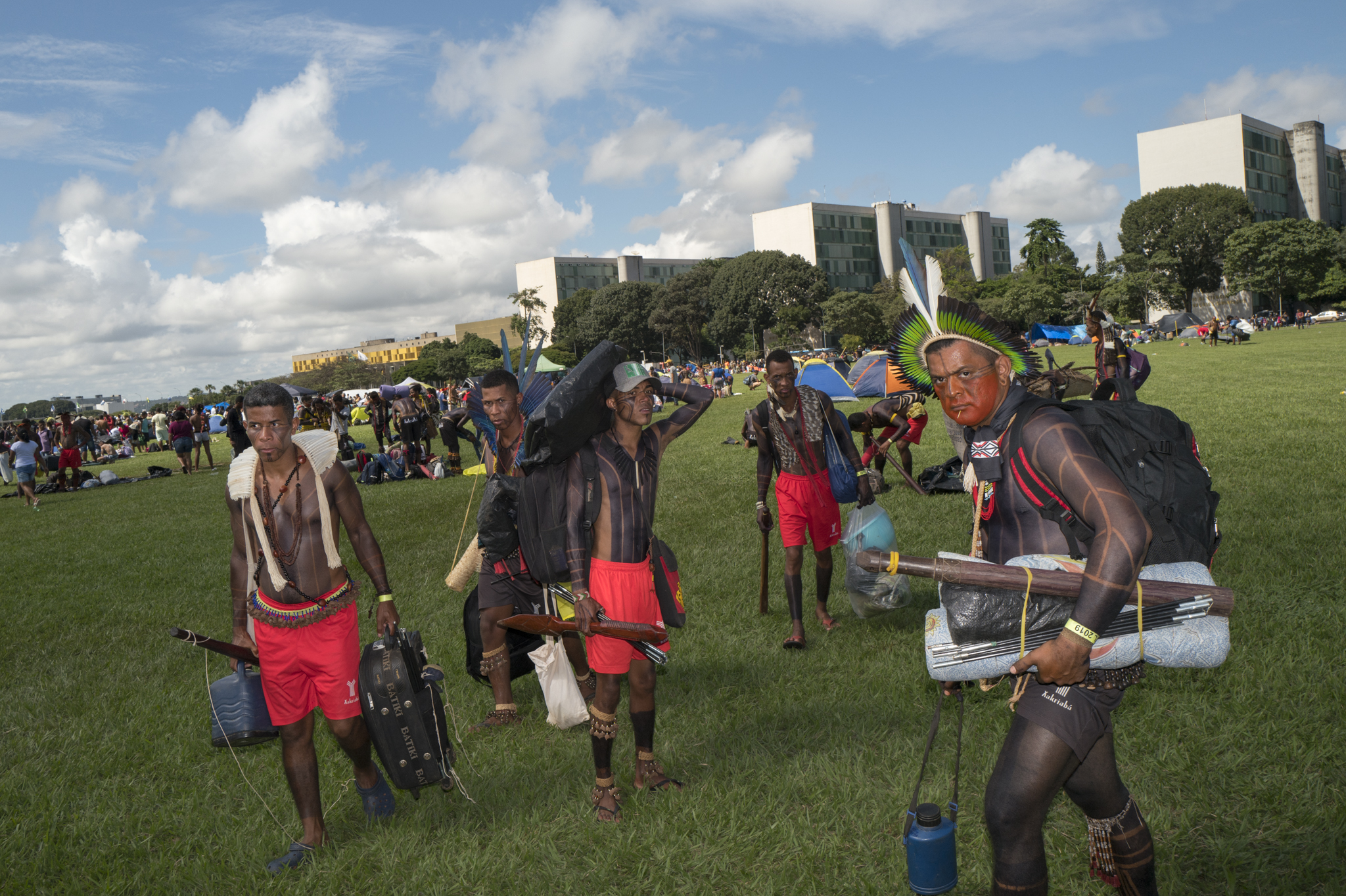  Young Xakriabá men  leave the camp near the presidential buildings of brasilia after the military intimidation of the use of force against the Free Land camp in Brasilia. 