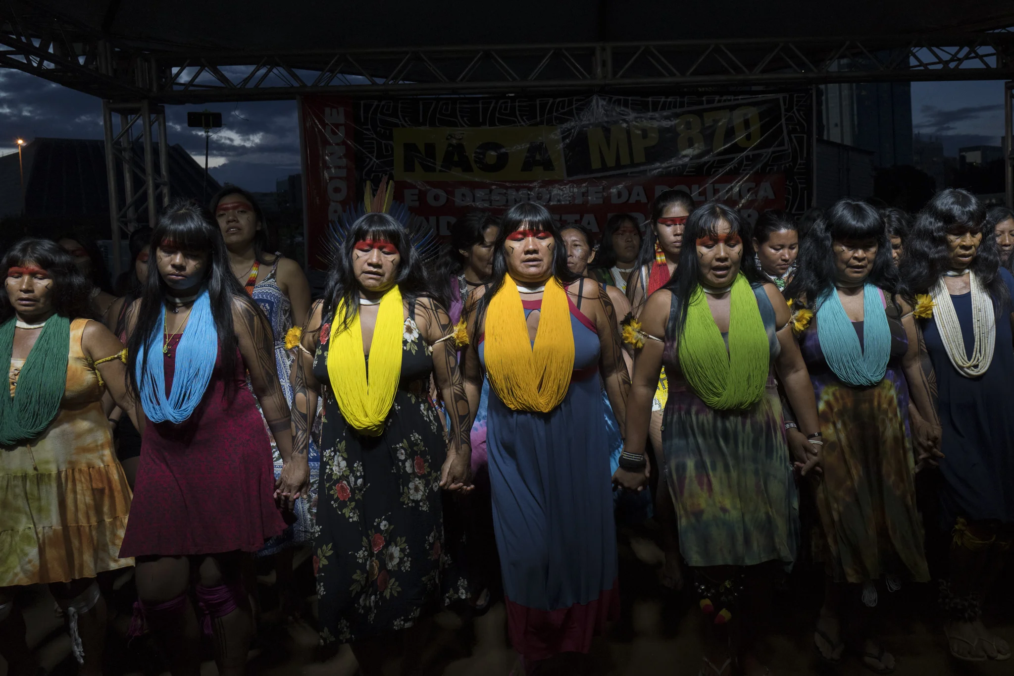  Waiapi women perfoming a traditional ritual on the stage of Free Land Camp in Brasilia. Role of indigenous women ... 