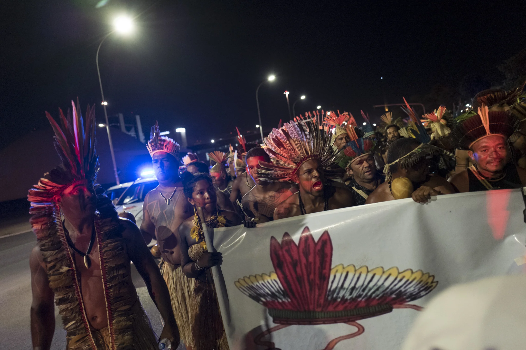  Indigenous people walk the path that leads to the Brazilian government building protesting for the respect of indigenous rights 