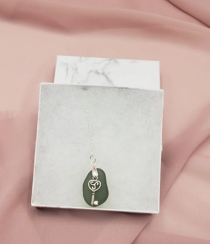 emerald green with key-silver necklace.jpg