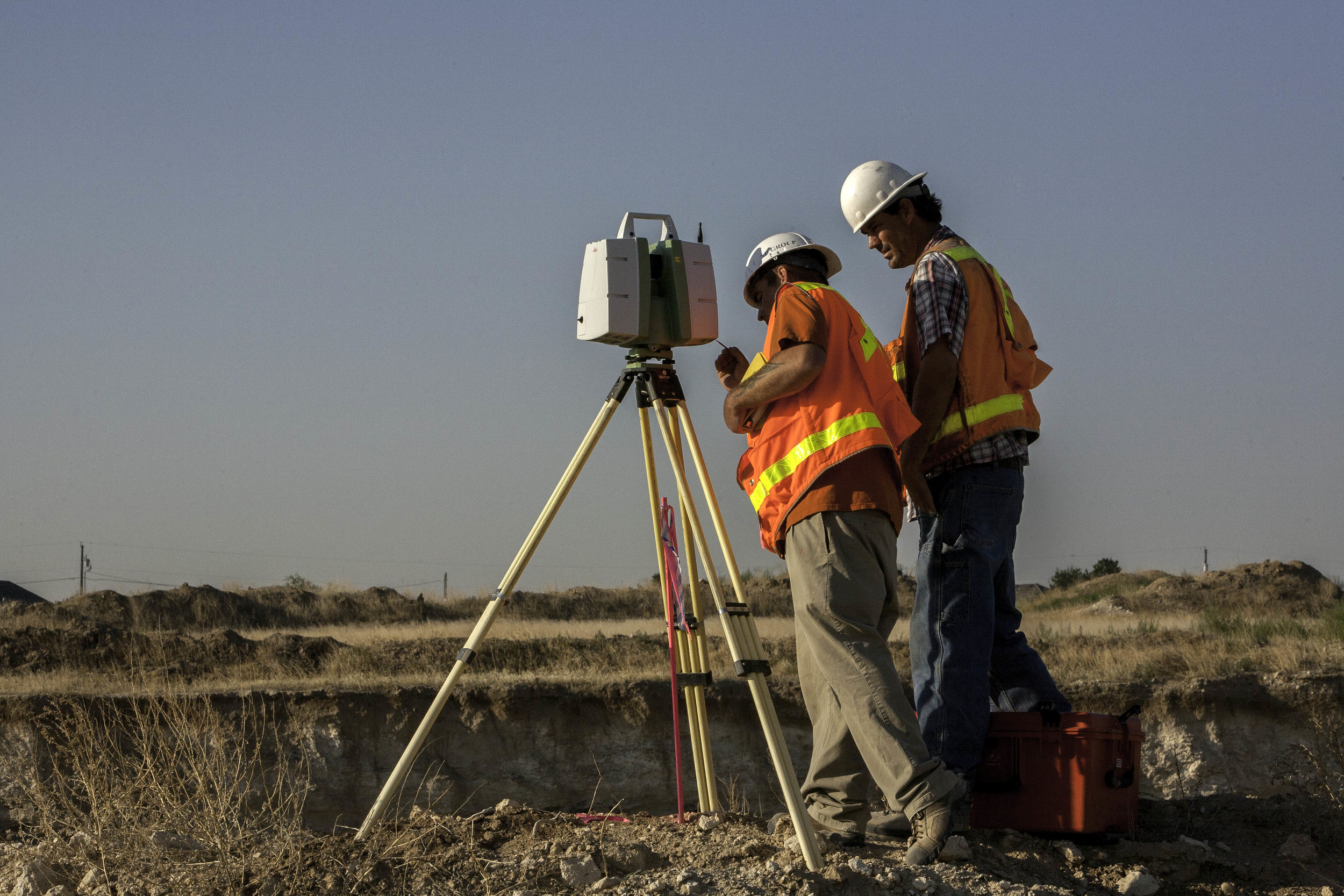 two surveyors performing survey 