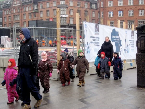 Children wear snowsuits when there is no snow, and it's 45F