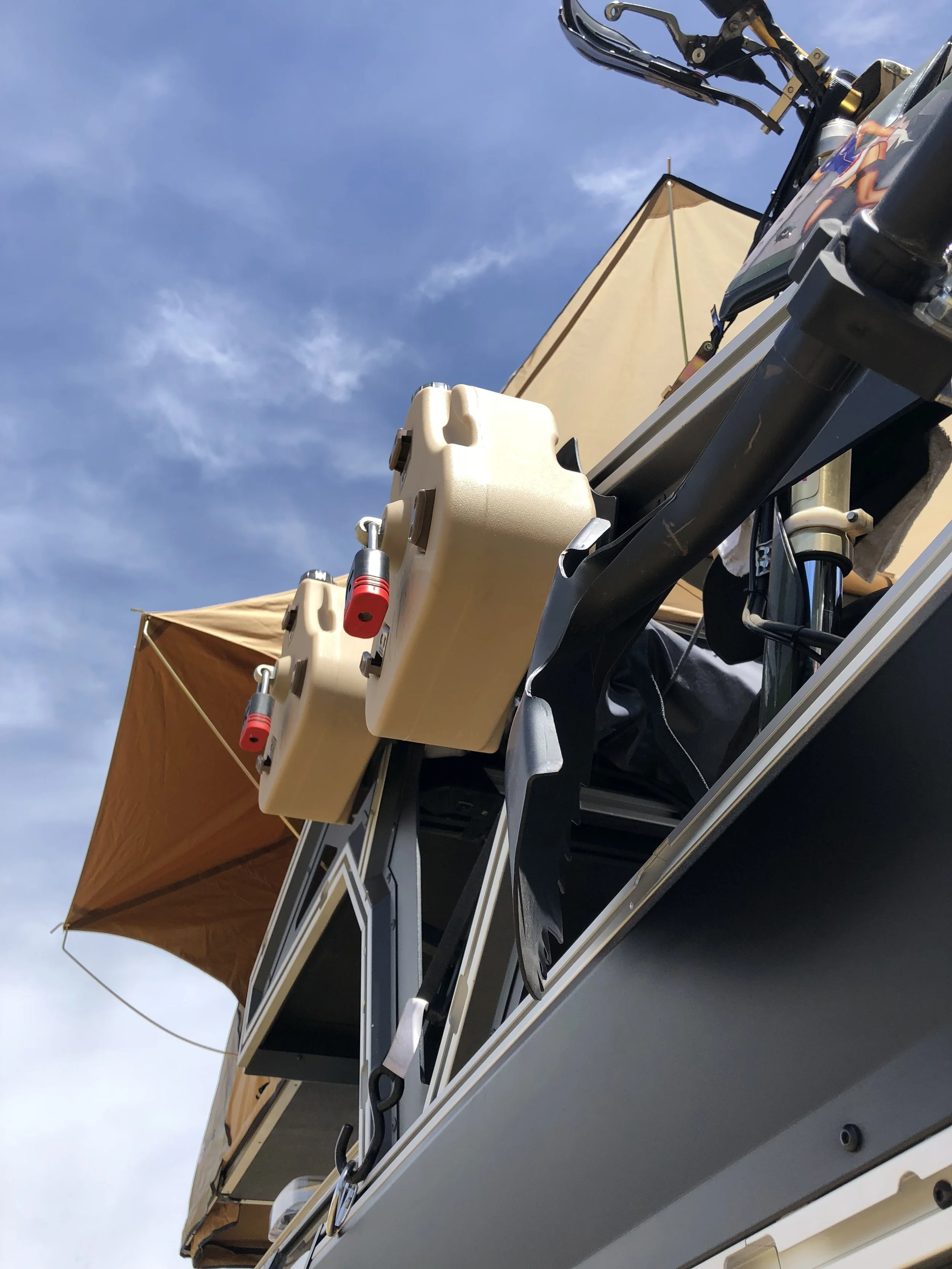 A toy hauler that attaches to our modular truck bed that gives you an upper deck over the cab for ATVs, roof top tents or additional storage.