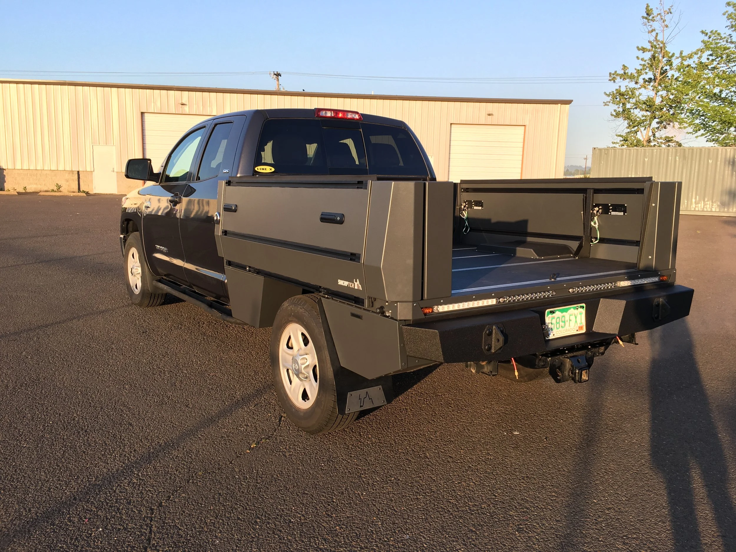 Space-Saving Truck Camper Truck camper, Wooden truck SherpTek Debuts Overla...