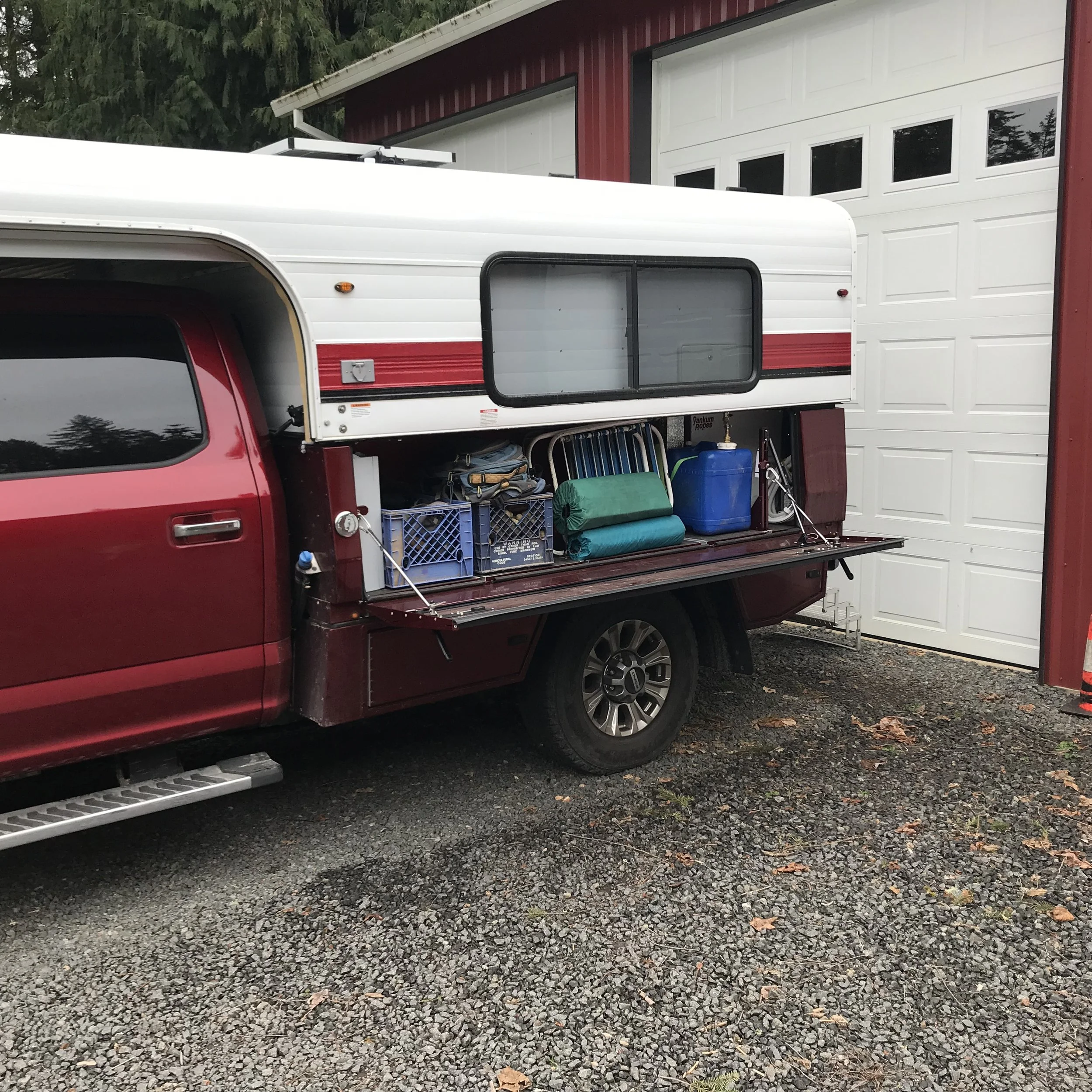 Alaskan camper on SherpTek flatbed system — SherpTek Custom Gear