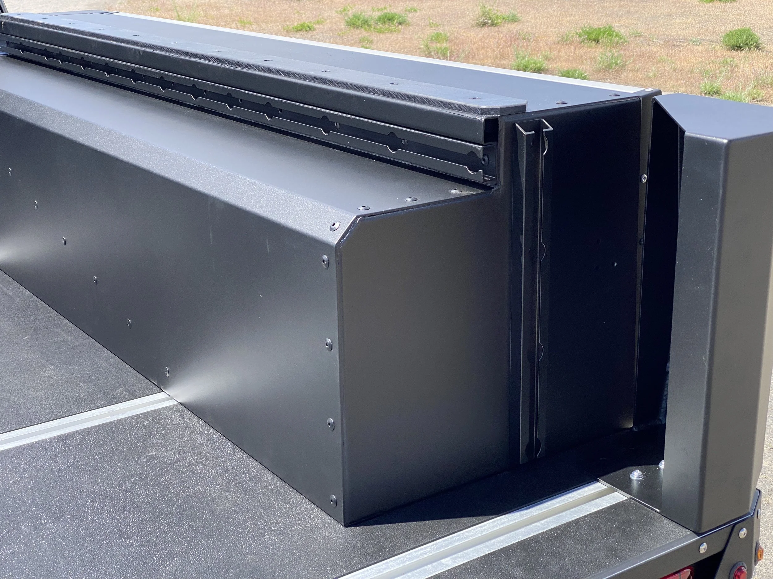 The "hide box" keeping gear secure.