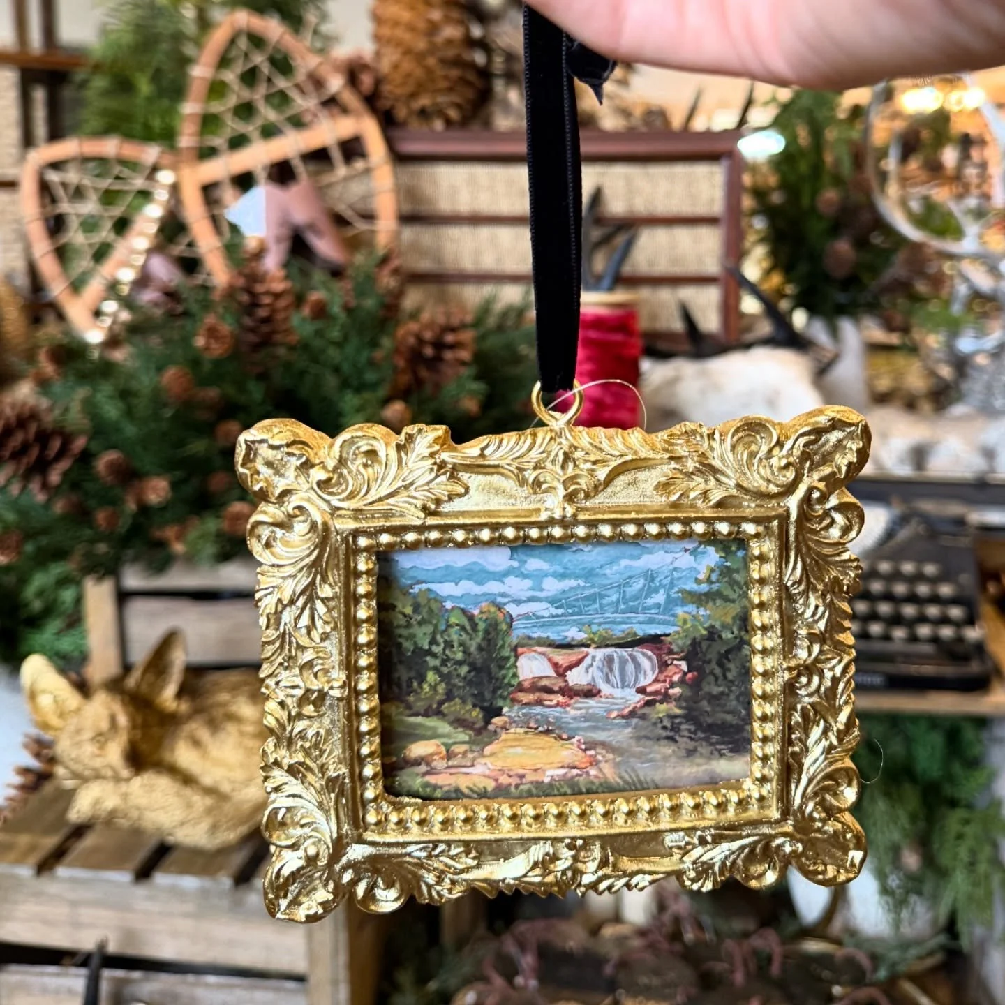 Sneaking in a quick social media break while we set up for Christmas to show off my favorite ornament of the season!