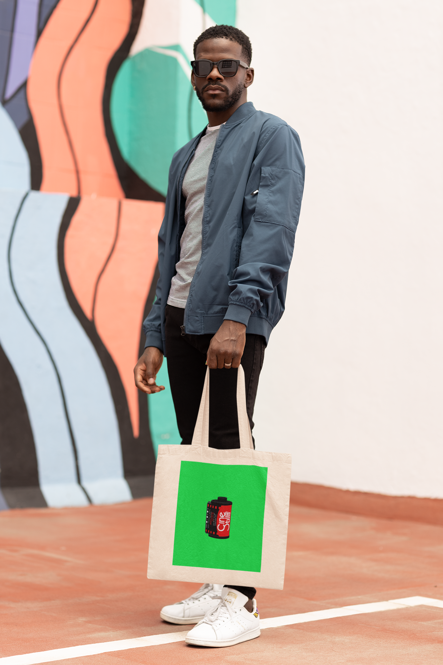 mockup-of-a-cool-man-with-sunglasses-and-a-tote-bag-m28699.png
