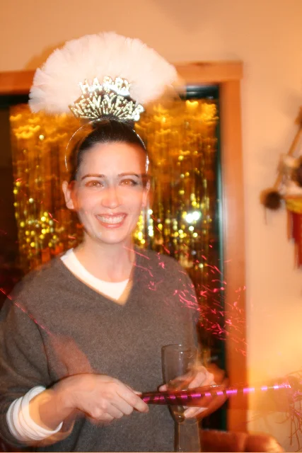 Tania celebrates the start of 2010 with a Vegas-style headpiece… tres chic…
