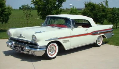 new General Manager Bunkie Knudsen made a statement with the 1957 Pontiac Bonneville . removing those tired silver streaks from the hood CAUSED A STIR. IT WAIVED GOODBYE to the Pontiac of old, as a Fuel Injected V8 ushered in a new era as GM's performance division. ( www.Hemmings.com )