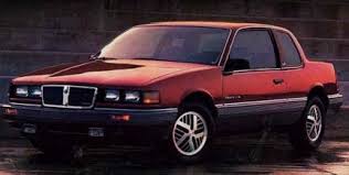 1985 PONTIAC GRAND AM - BY ITS THIRD ITERATION, THE GRAND AM FINALLY ACHIEVES SUCCESS ON THE SALES CHARTS. FOR ANYONE WHO APPRICIATES STYLE AND DESIGN, IT'S ENOUGH TO MAKE YOU WEEP. ( www.cargurus.com )