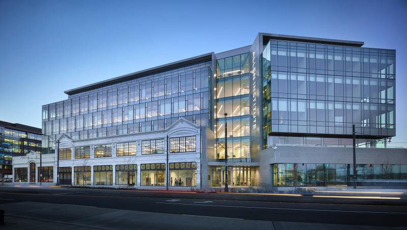 Restored historic buildings were integrated into the south facing facade of the Allen Institute. Photographer: Ben Benschneider
