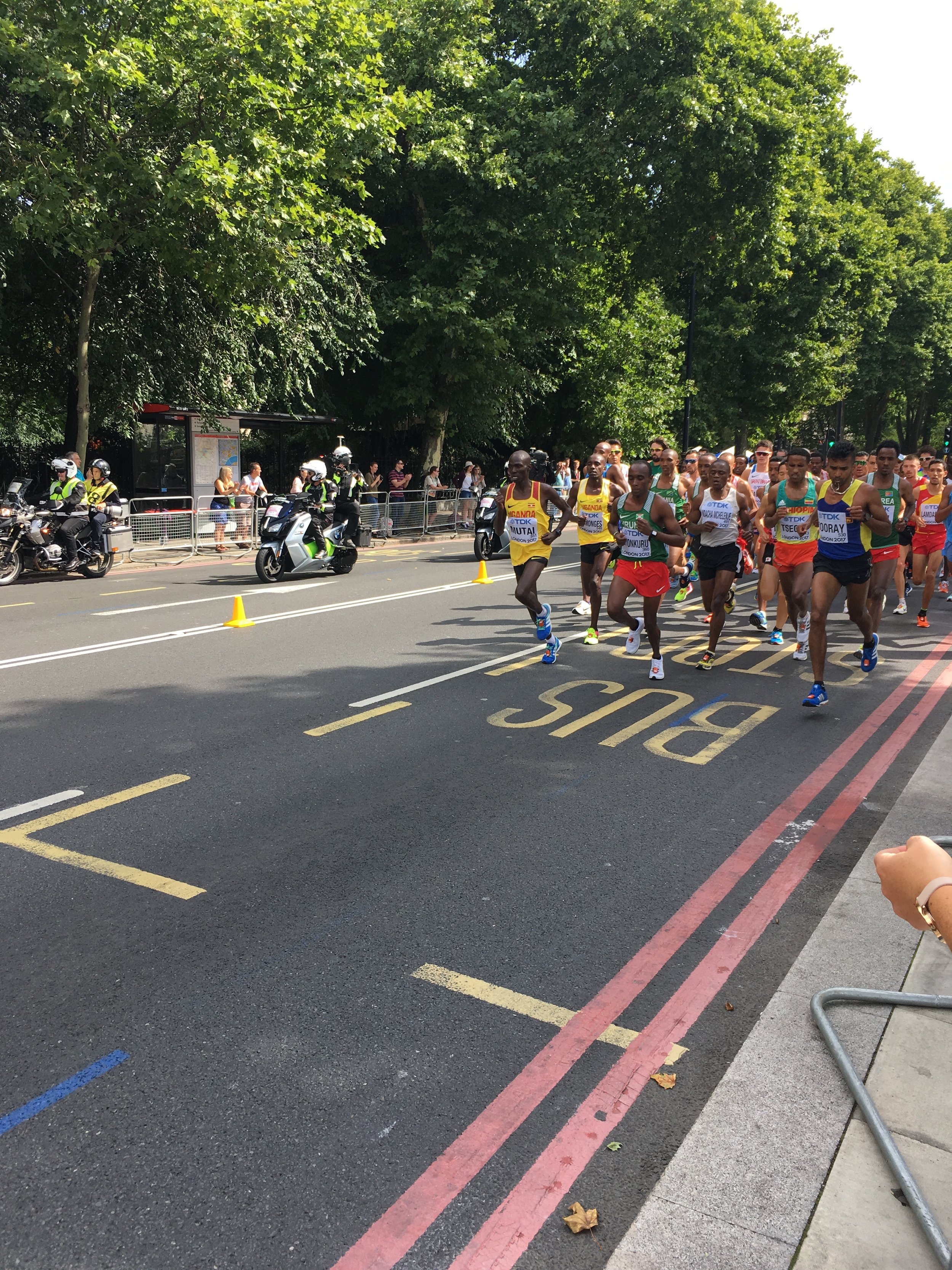 Men's leaders around 5K. It was a four loop course, so you got to see the runners eight times. That is, if you stood on the barricades all day (first men's race, then women's). As I did. You're welcome.