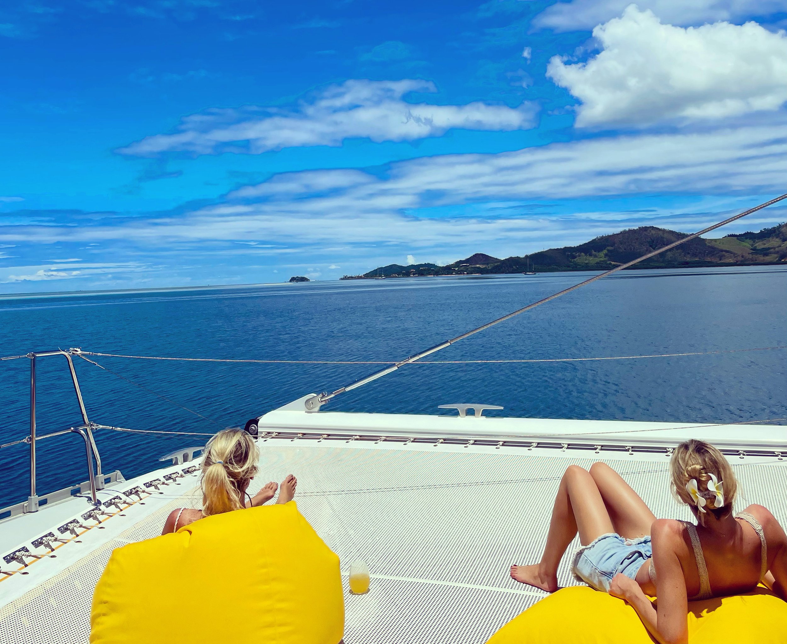 Copy of Sunbathign aboard the South Seas Sailing catamaran with Hannah Townsend while we explore the Mamanuca island chain.jpg