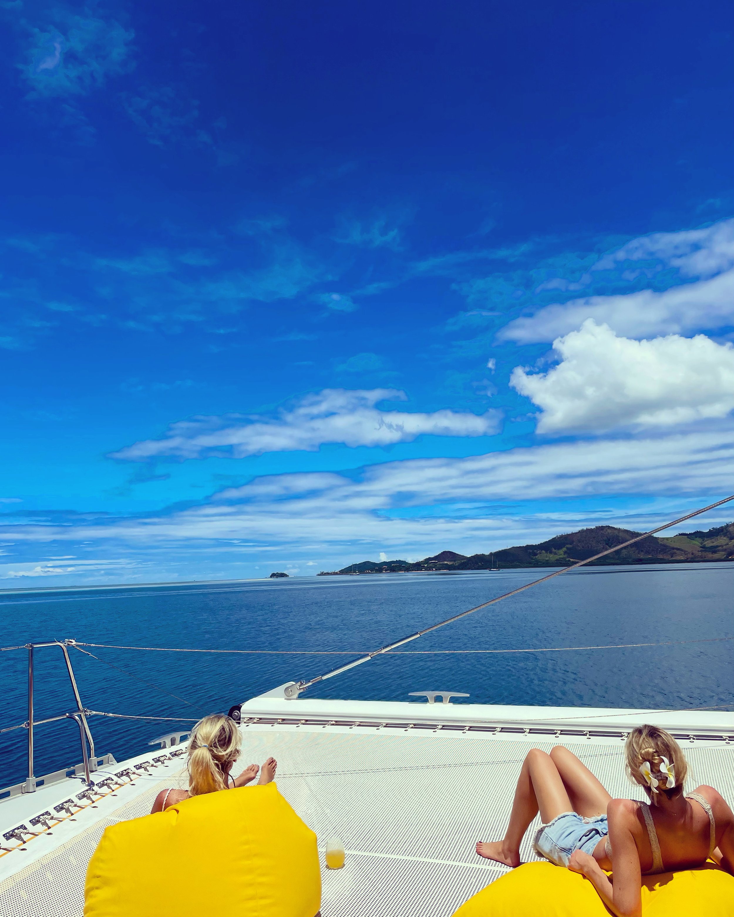 Copy of Sunbathign aboard the South Seas Sailing catamaran with Hannah Townsend while we explore the Mamanuca island chain.jpg.jpg