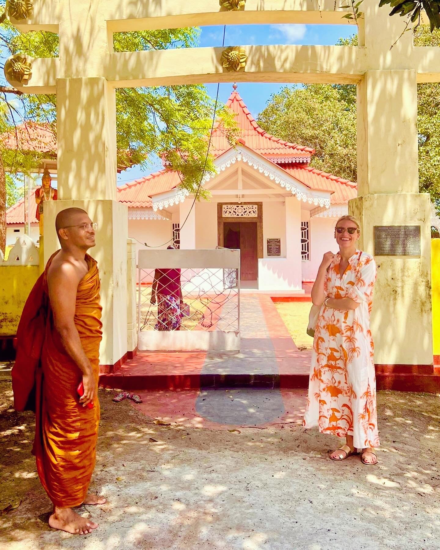 The author visits a Buddhist temple and meets a monk in Sri Lanka.jpg