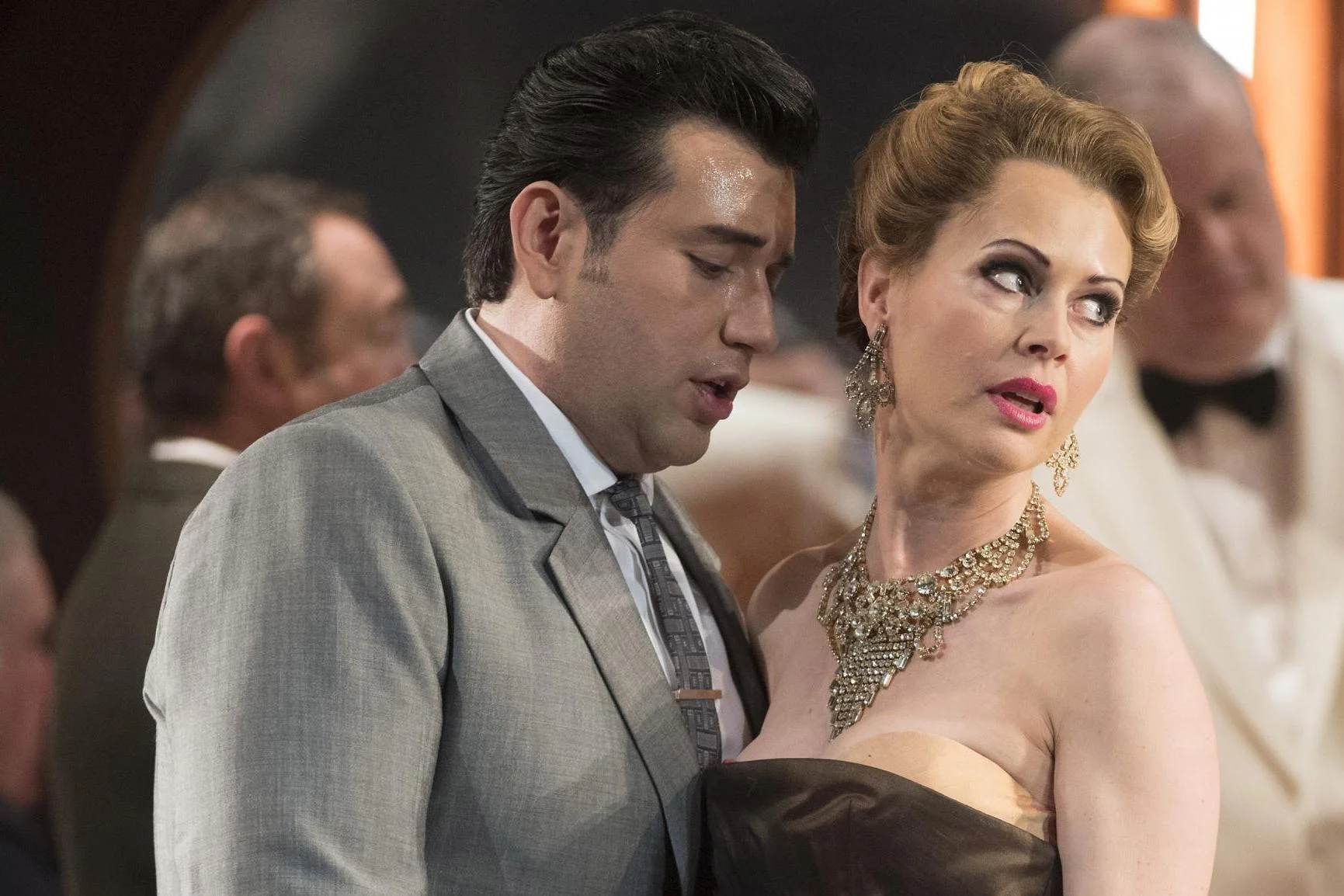 Too close for comfort. Photo by Alastair Muir. Joshua Guerrero and Joanne Appleby in Jonathan Miller's mafia-era Rigoletto (2017).