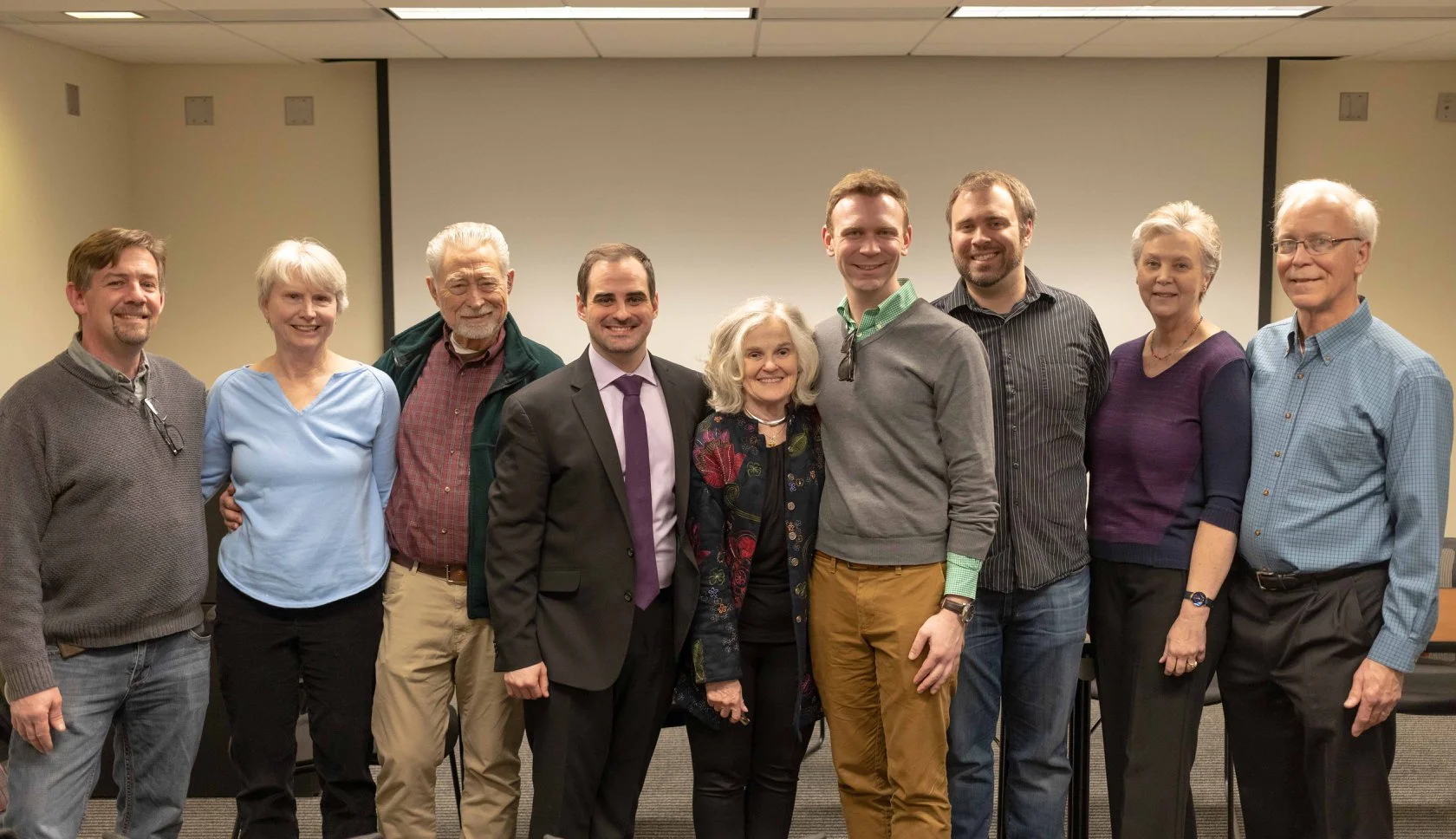 Austin and his family at doctoral defense