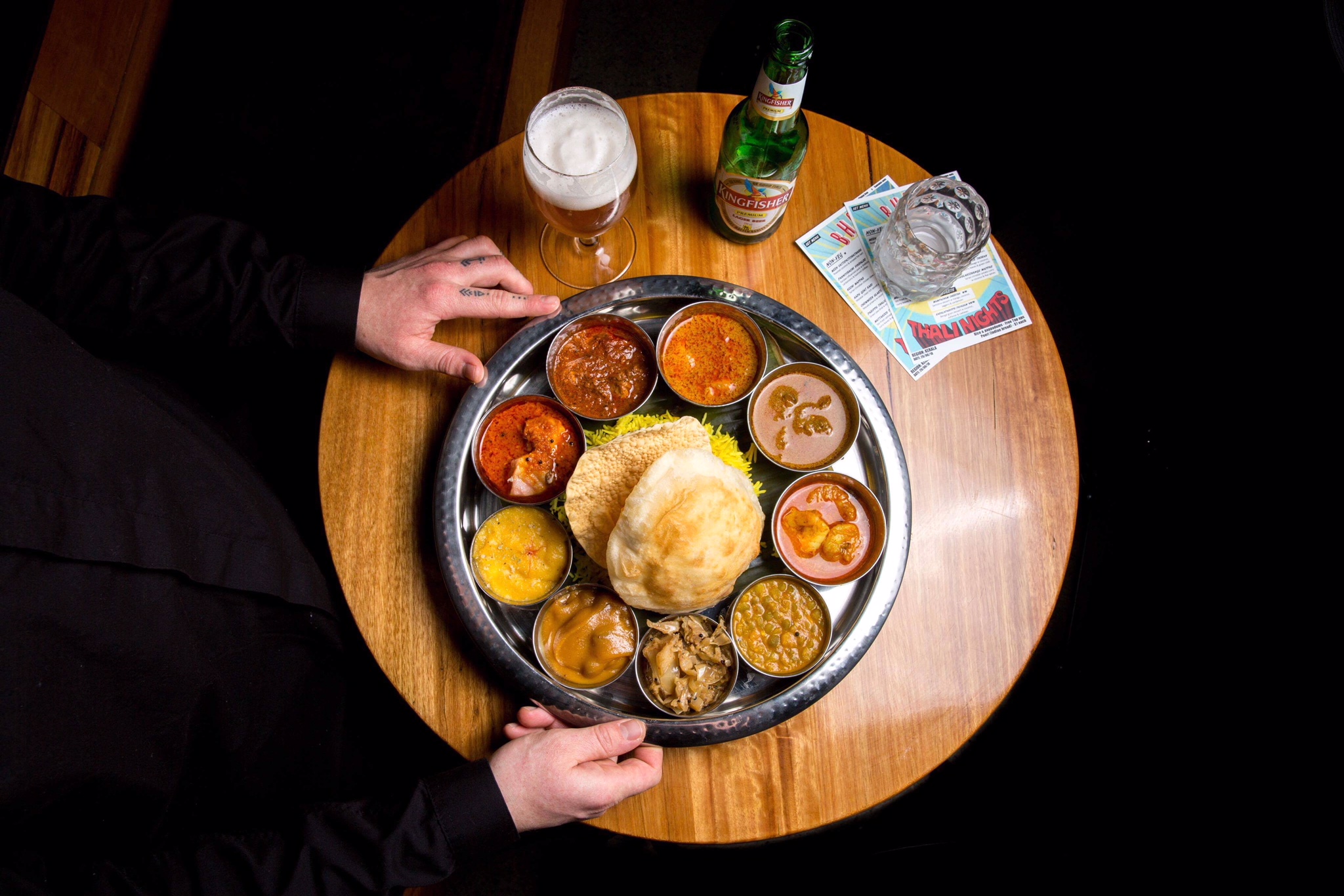 Bhang Thali served at Eat Drink Bhang in Brunswick, with a selection of Indian curries, sides, rice, bread and accompaniments.