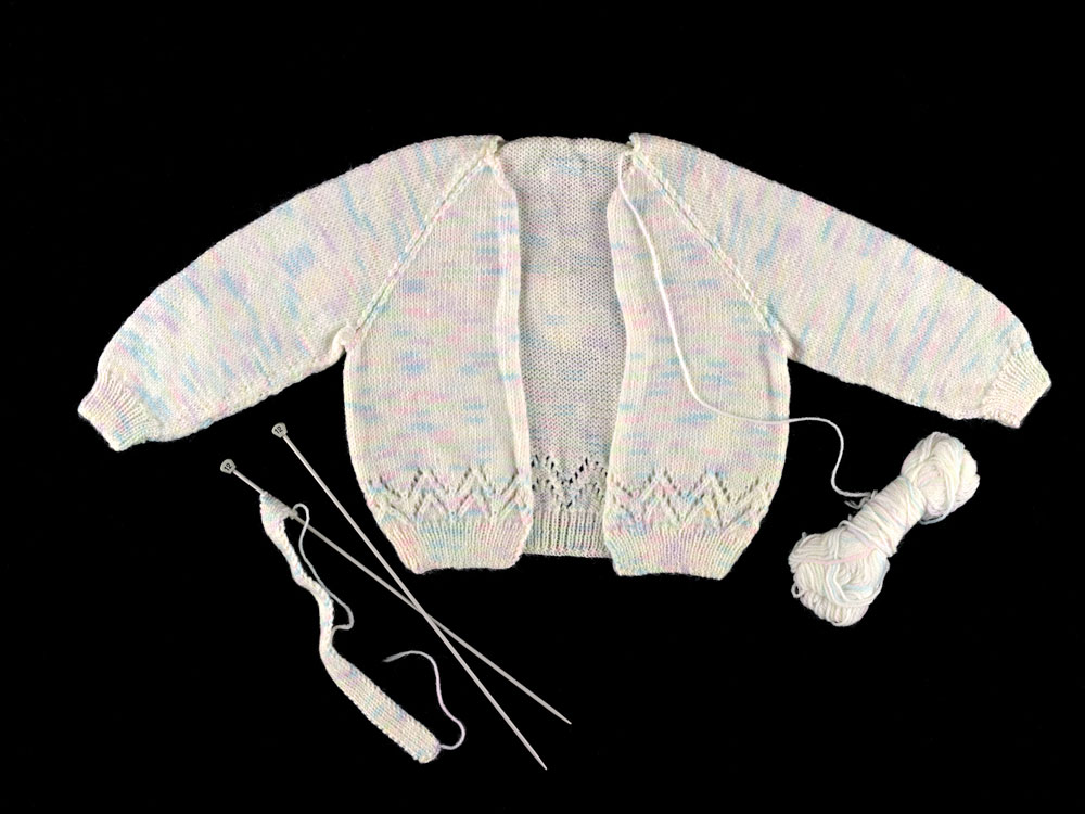 Incomplete jumper knitted by Kim McIlveen, 1974. Photographer: Angus Kendon.