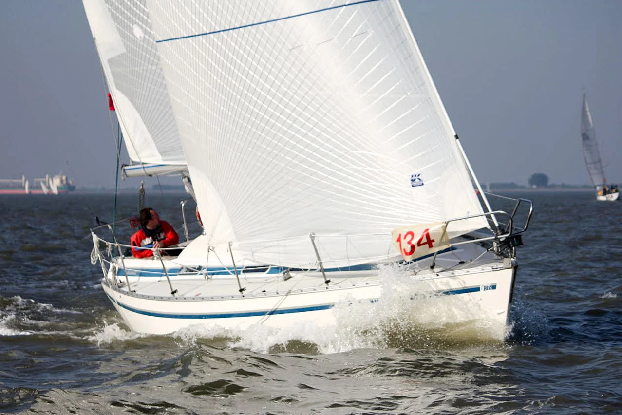 A 31-foot cruiser-racer with a set of Tape-Drive silver sails. Click to enlarge.
