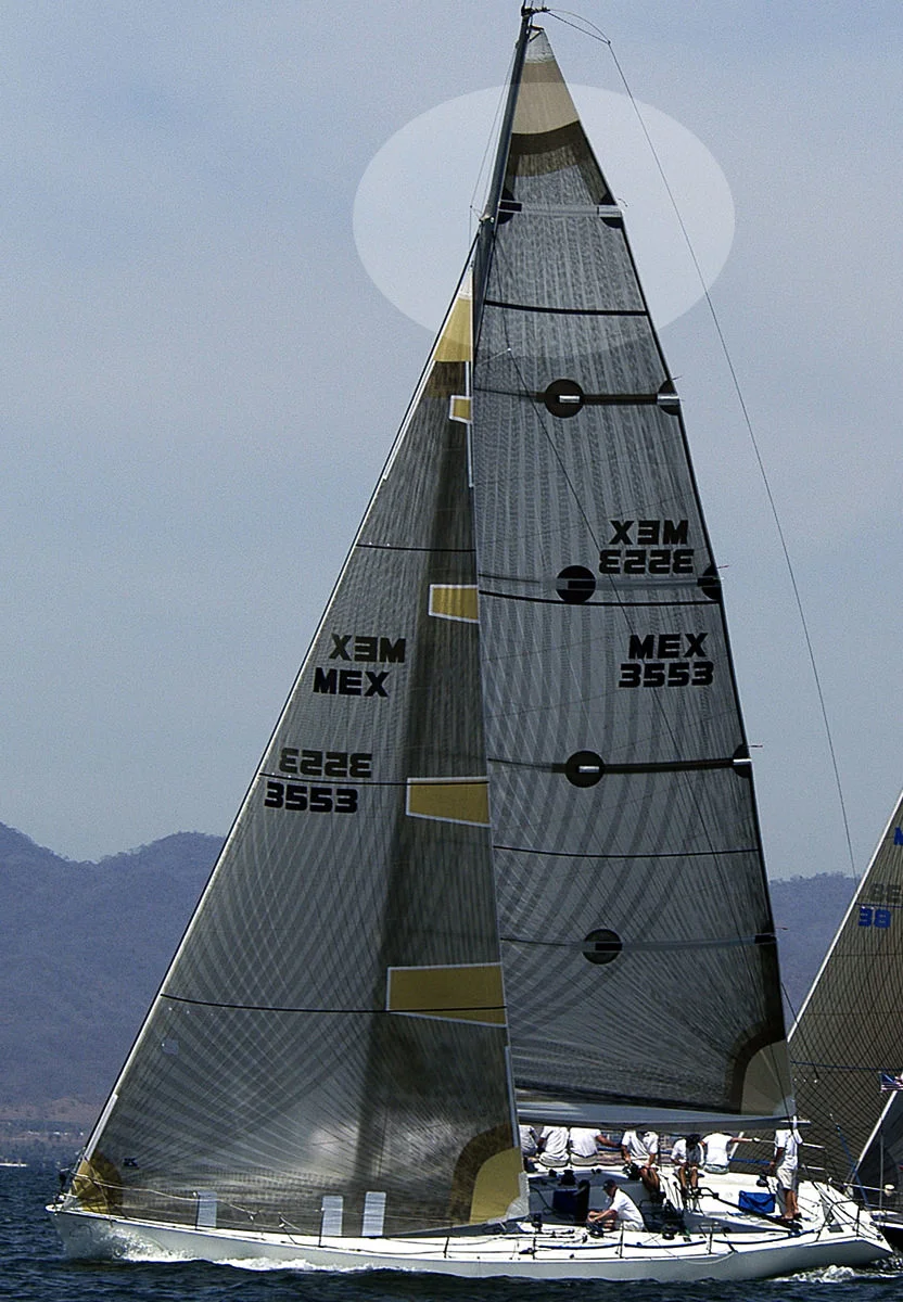 Titanium mainsail with a full length top batten and four partial length battens.