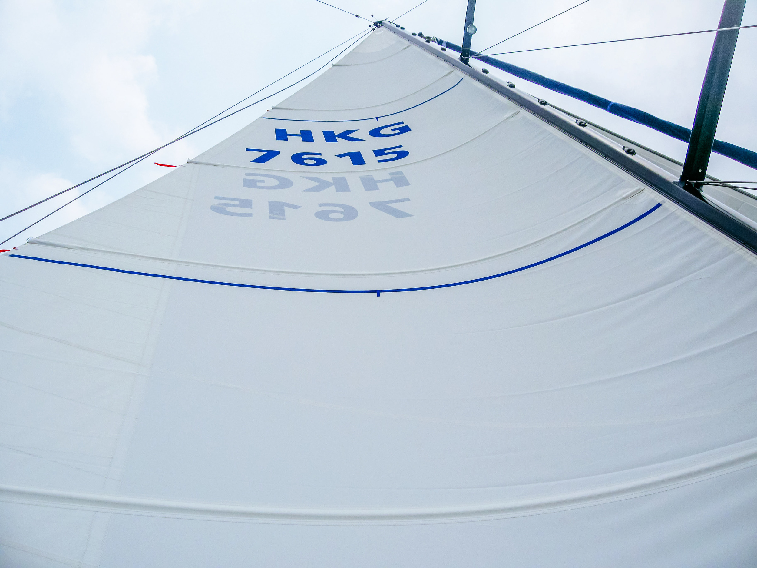 Contrasting draft stripes help sail trimmers see the aerodynamic shape of the sail.