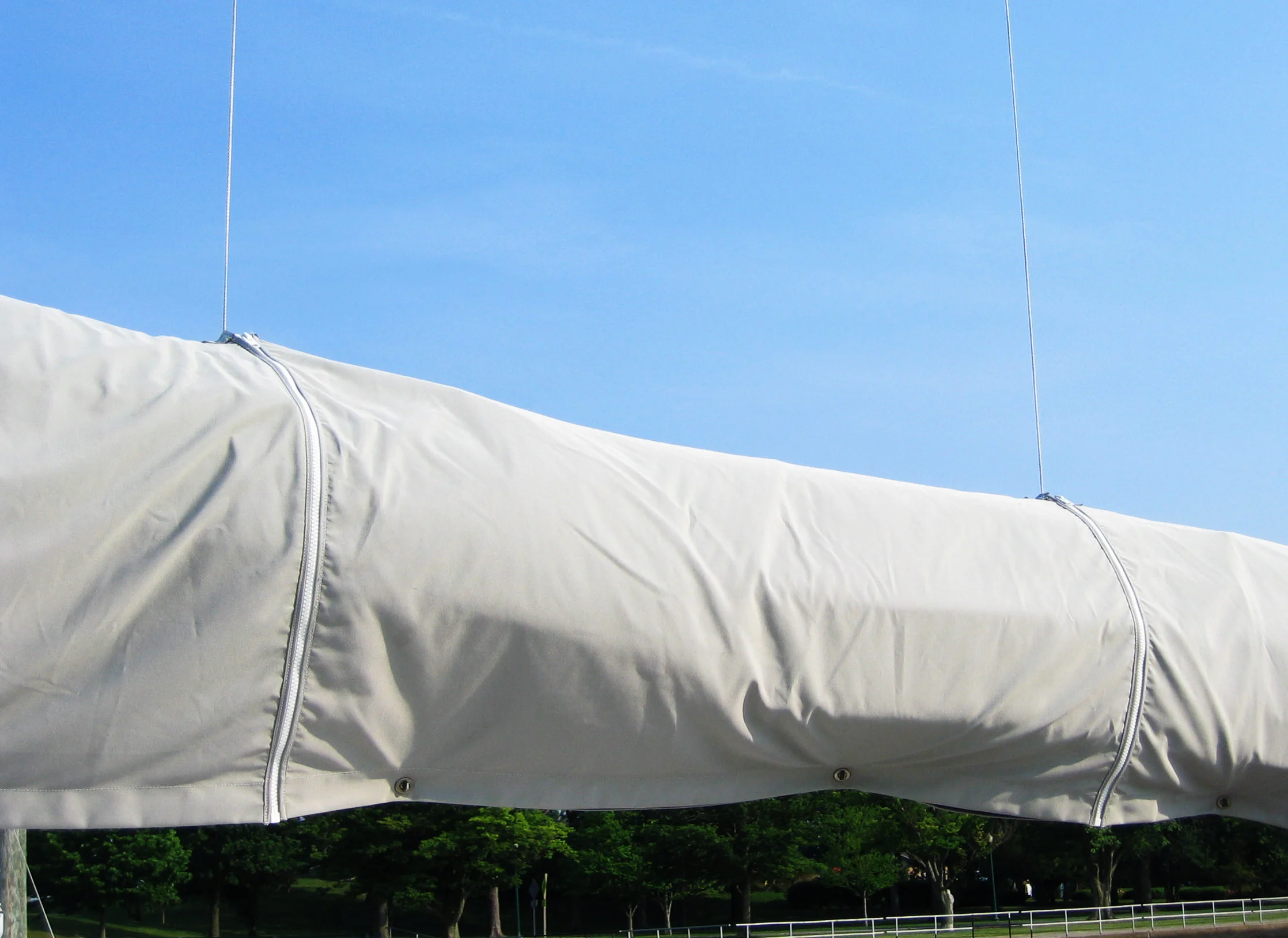 When the Dutchman system is used sail covers require carefully placed zipper slits.