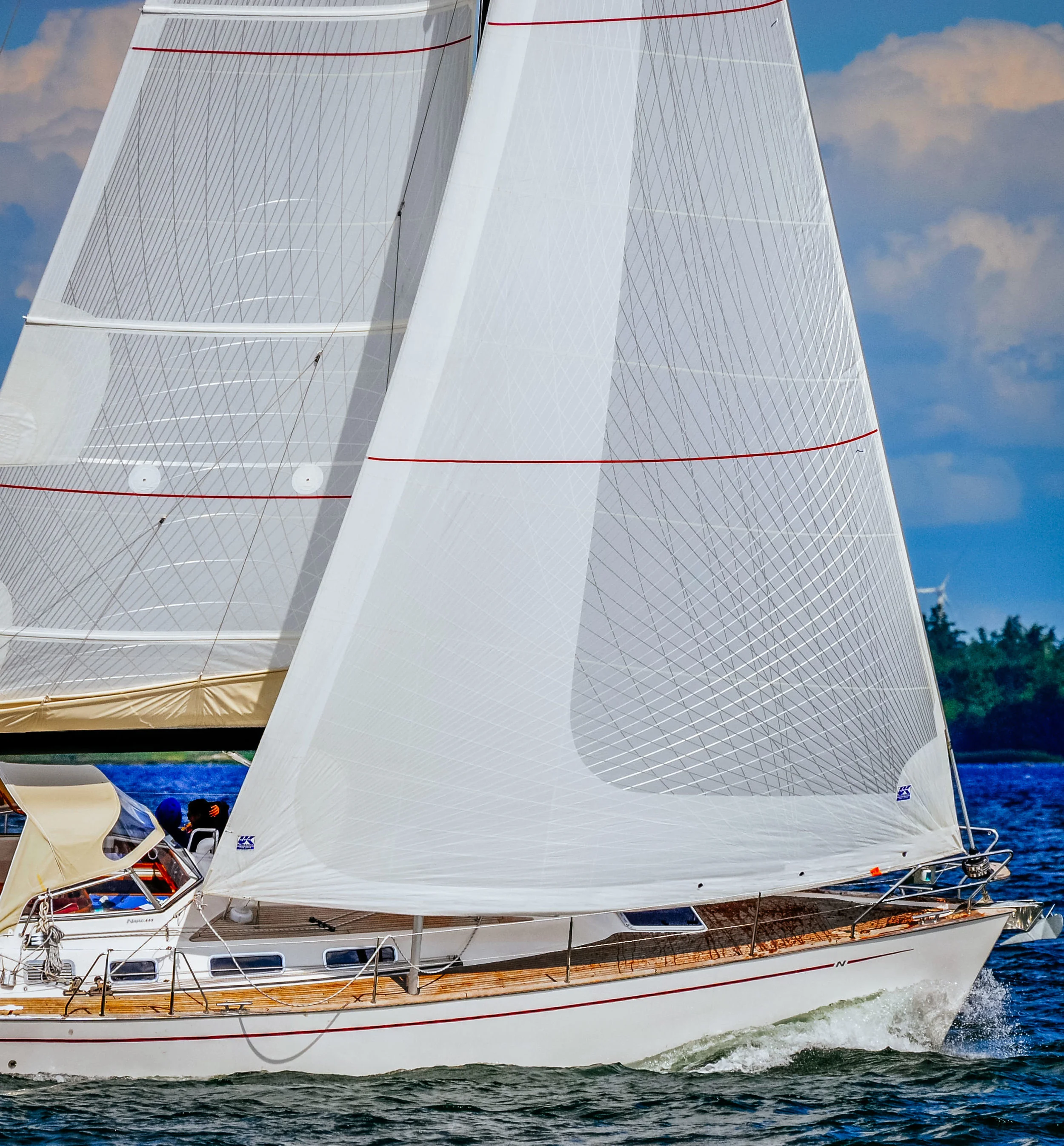 A Tape-Drive Silver Passagemaker Genoa with Taffeta covering the tapes on the portion of the sail that overlaps the mast. Click to enlarge.