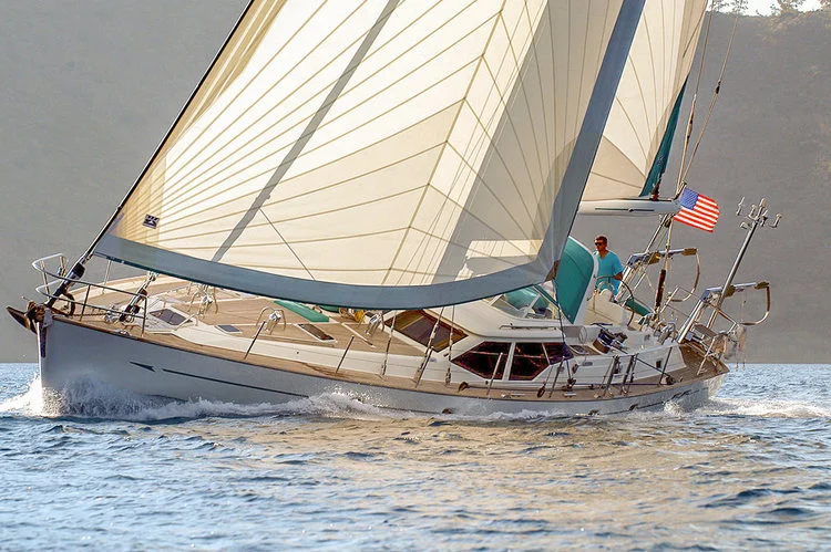 Roller-furling cruising radial Hydra Net® Passagemaker genoa and roller-furling mainsail with UV protection. The Passagemaker's standard features are a foam luff for better reefing and furling, reefing reinforcements on the foot and leech and UV covers on the foot and leech.