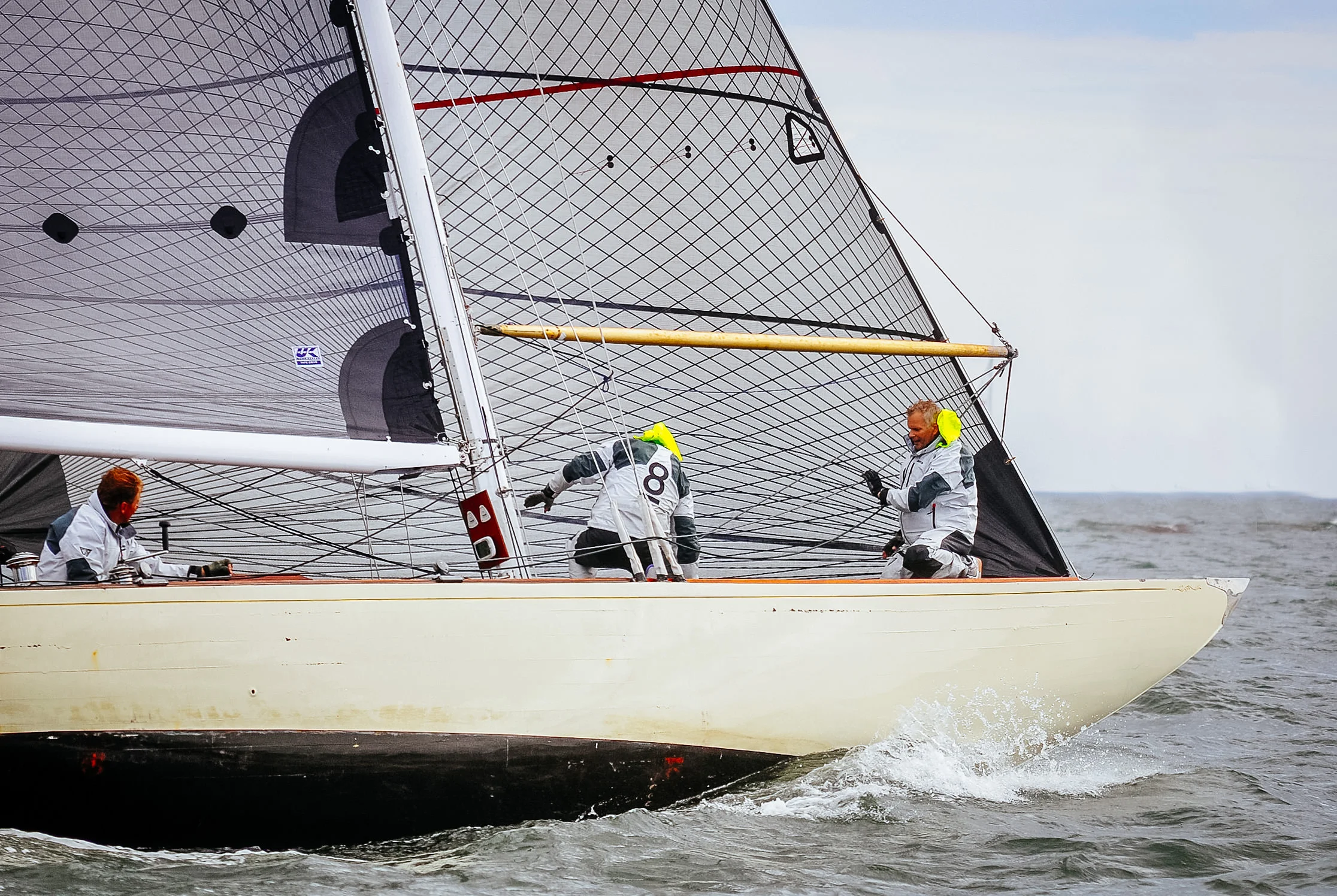 An 8-Meter with Tape-Drive carbon black aramid sails.