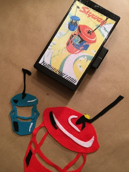 Felt appliques and the lacquer purse